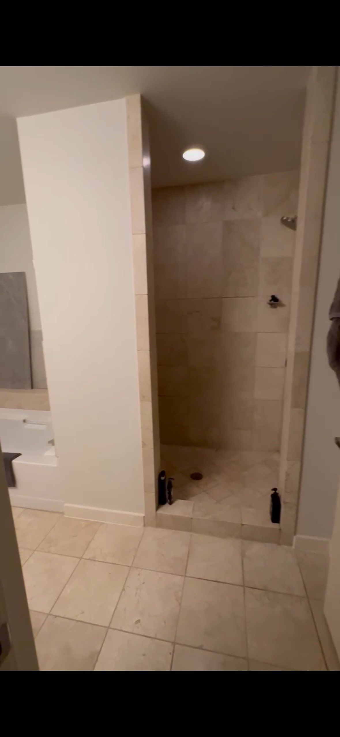Modern Bathroom Transformation by Fine Line Flooring Inc.