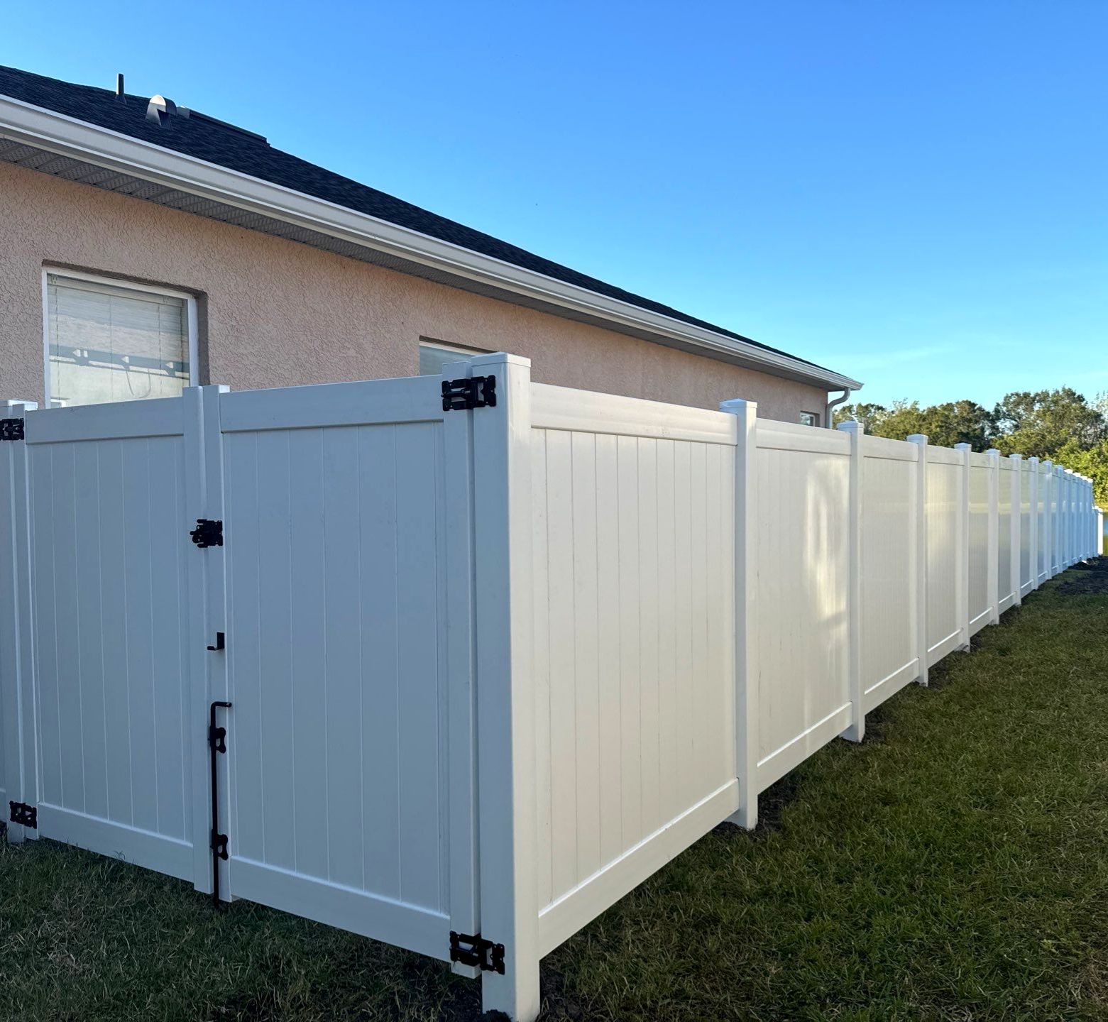Vinyl Picket Fence Installation using 6Ft White Vinyl Privacy Fence with a 4Ft White Clearwater Picket Fence by Asap fence and gates, LLC