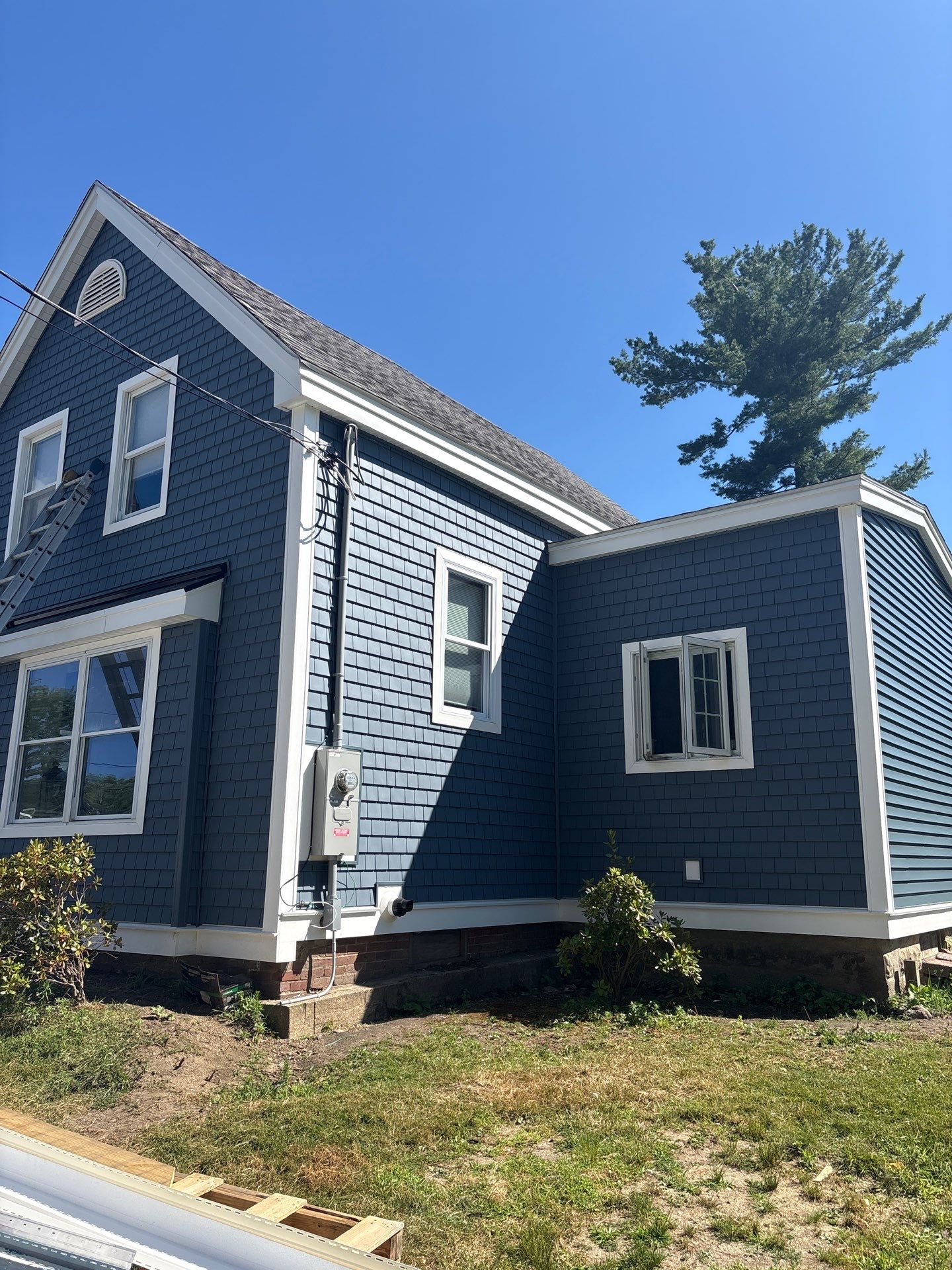 Premium Mixed-Material Siding Installation in North Billerica, MA by Mighty Dog Roofing of Greater Middlesex County