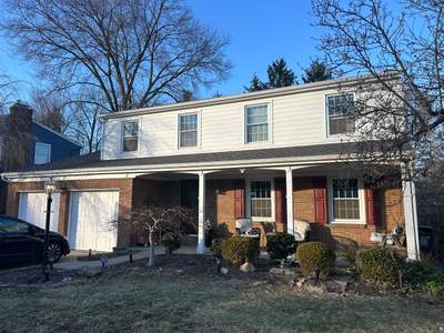 James Hardie Vinyl Siding Installation on Two-Story Brick Home in Sewickley