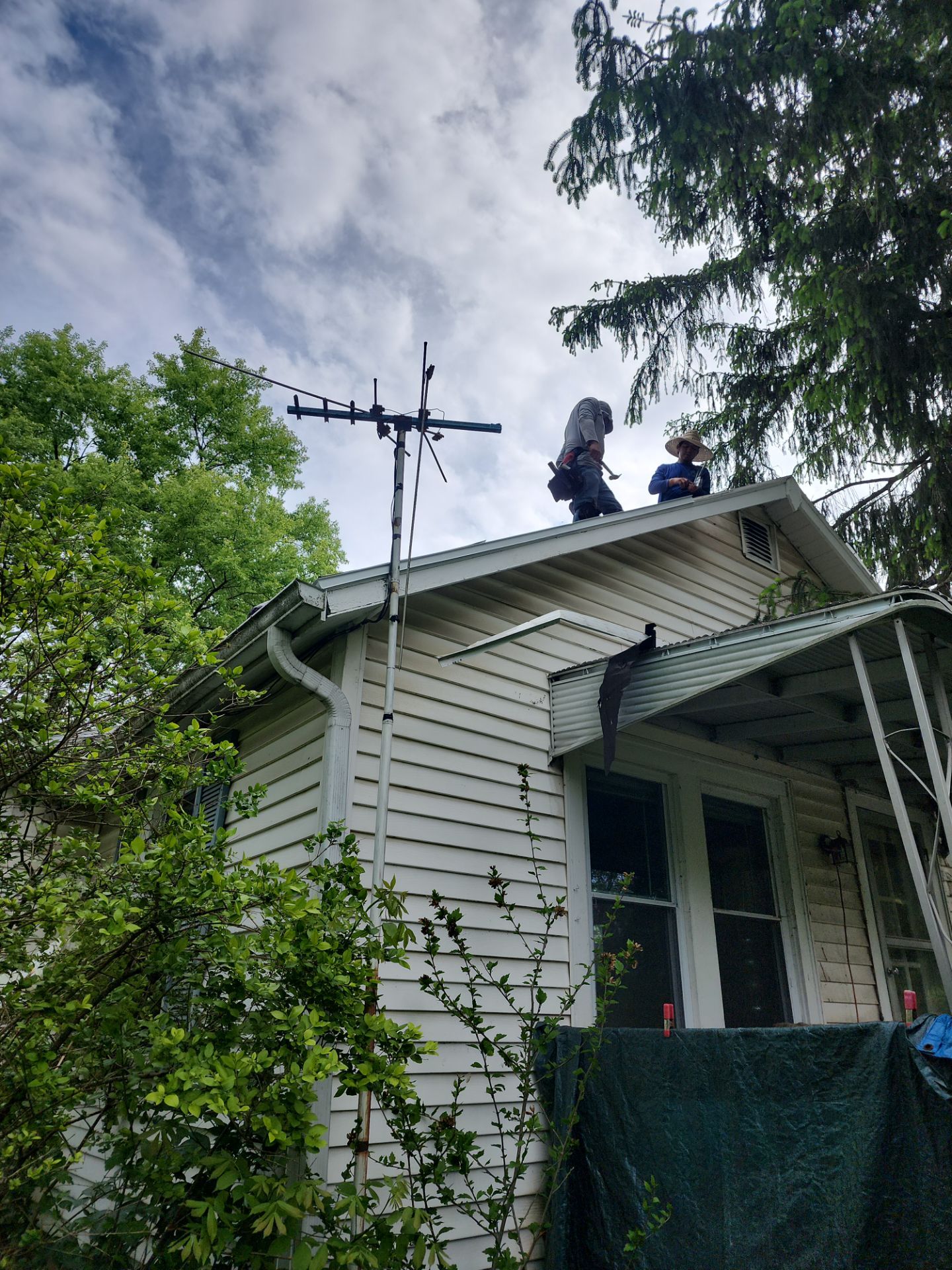 Re-roof the Art Studio nestled among the pines by SOS Home Ohio 