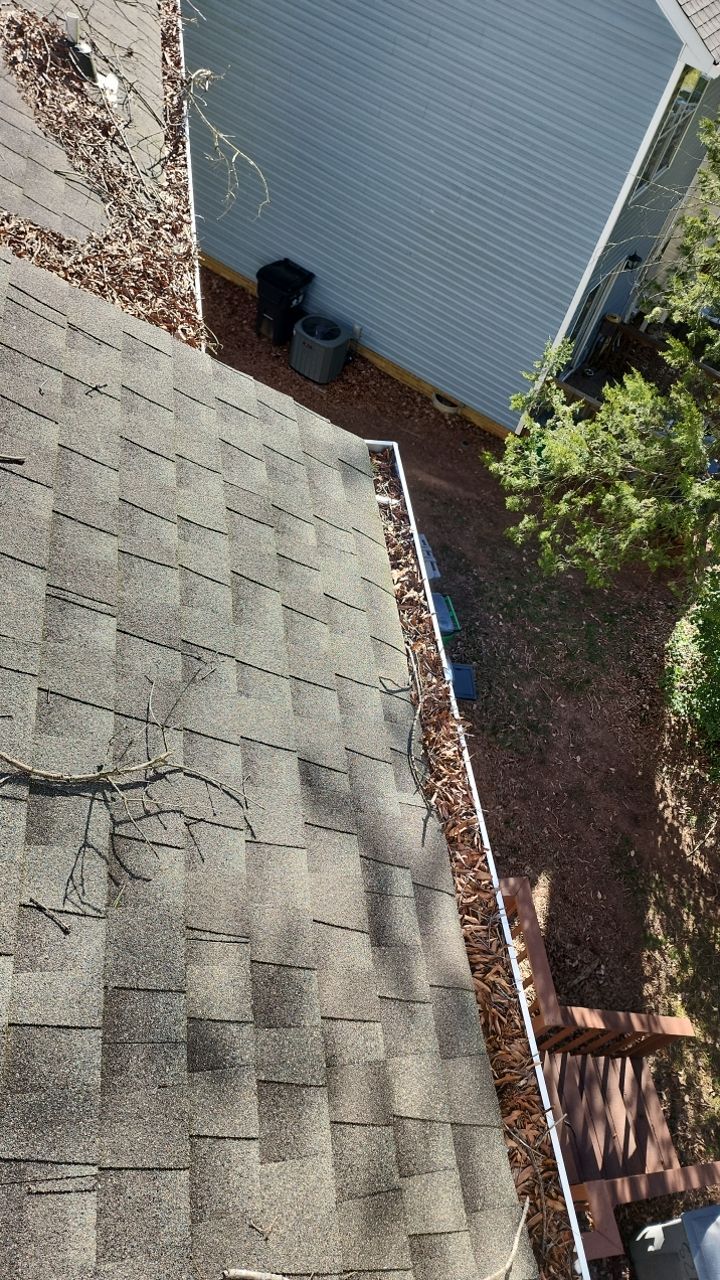 Gutter Cleaning using water by Power Wash Masters LLC