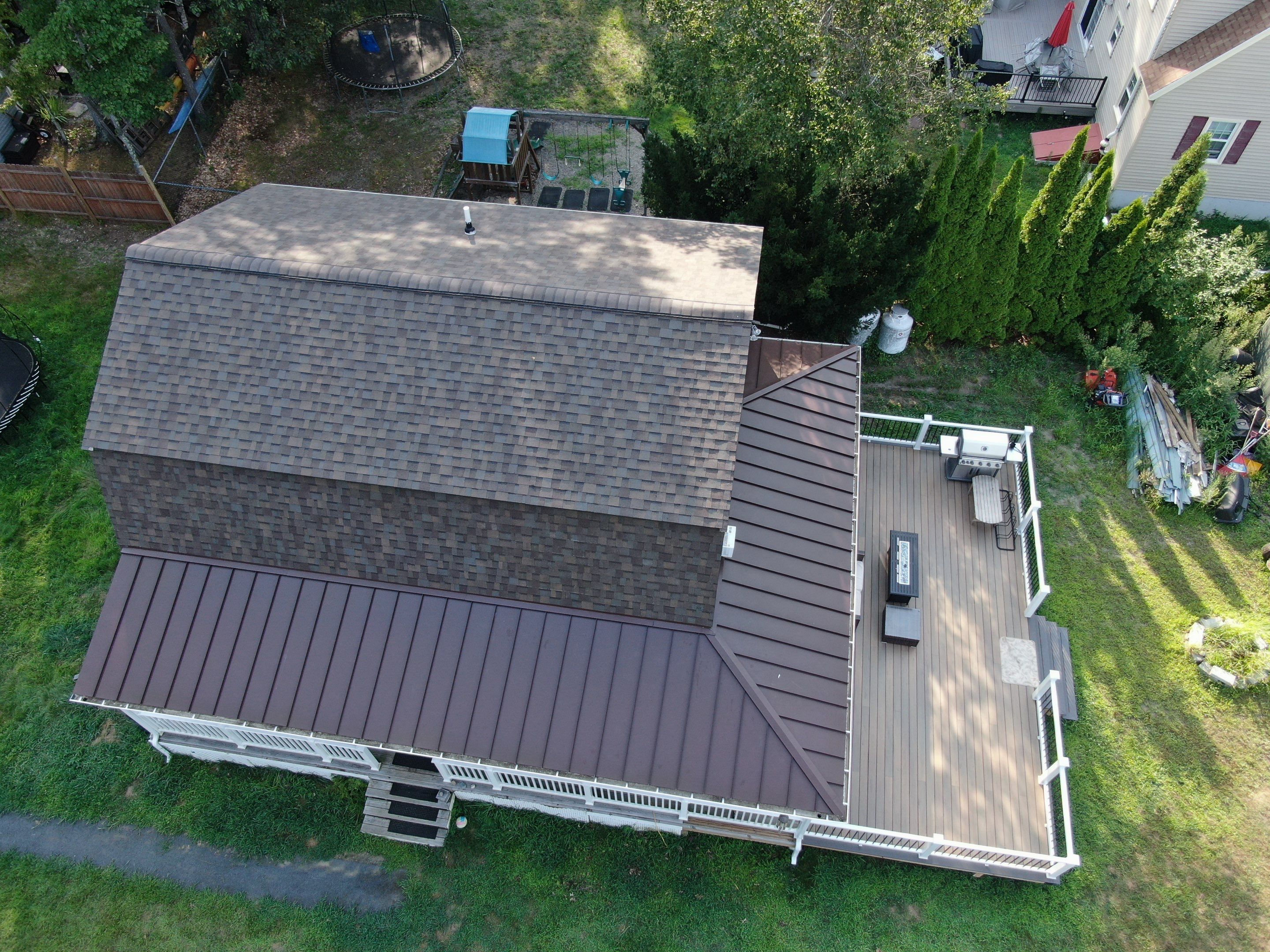 Full Roof Replacement & Farmers Porch Restoration – Asphalt + Standing Seam Metal by Mighty Dog Roofing of Greater Middlesex County