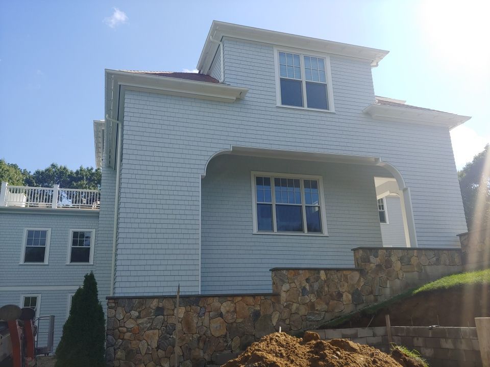 Gutter Installation using 6" Half Round Aluminum Gutter over Crown Moulding by Gutter Pro Enterprises