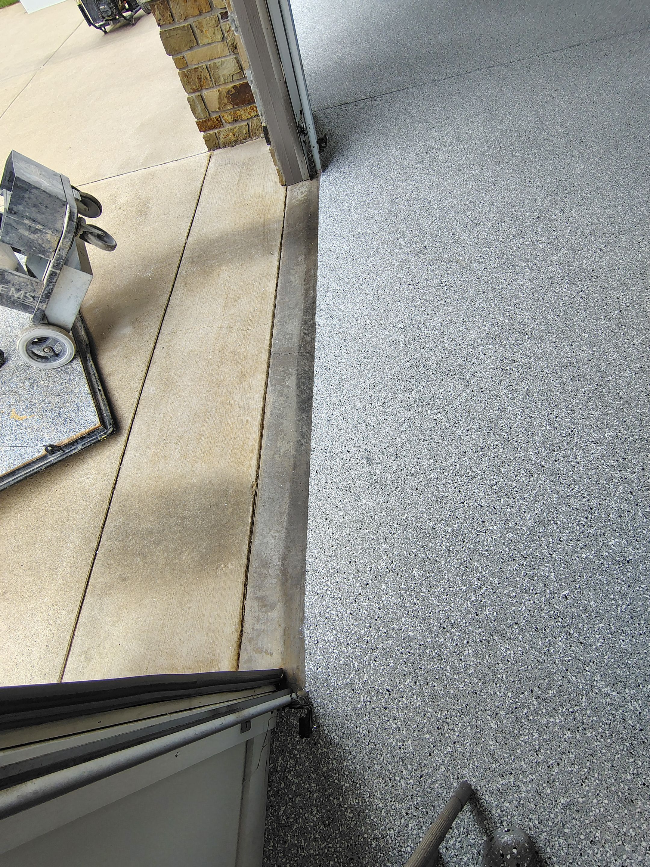 Feather Grey Floor Coating in Sioux Falls, SD by Select Painting, Coatings & Garage Cabinets