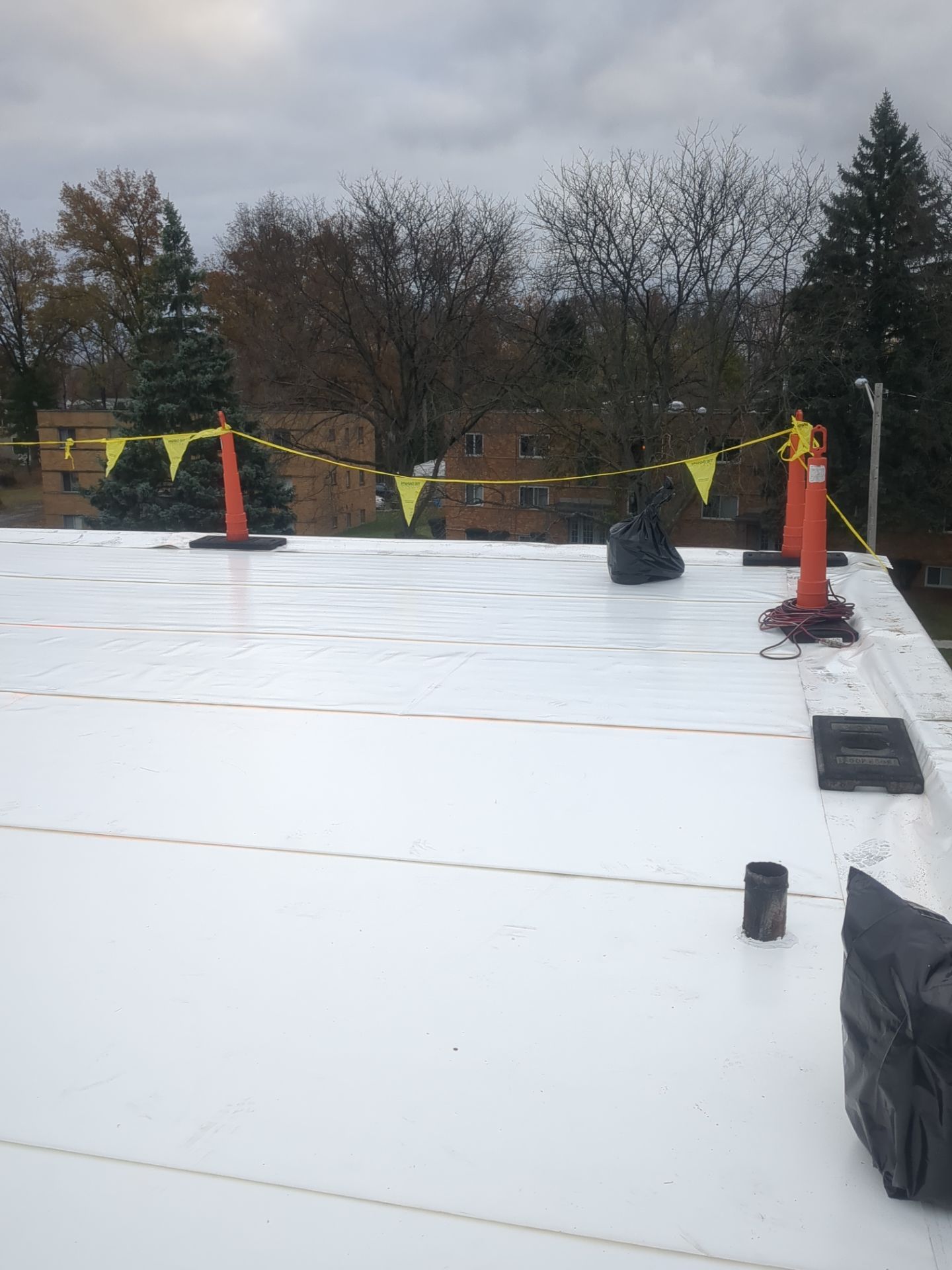 Commercial Roofing Installation using Duro-Last 50 mil PVC by 3 Daughters Construction 