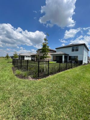 Aluminum Fence Installation using Black 3 Rail Aluminum Fence