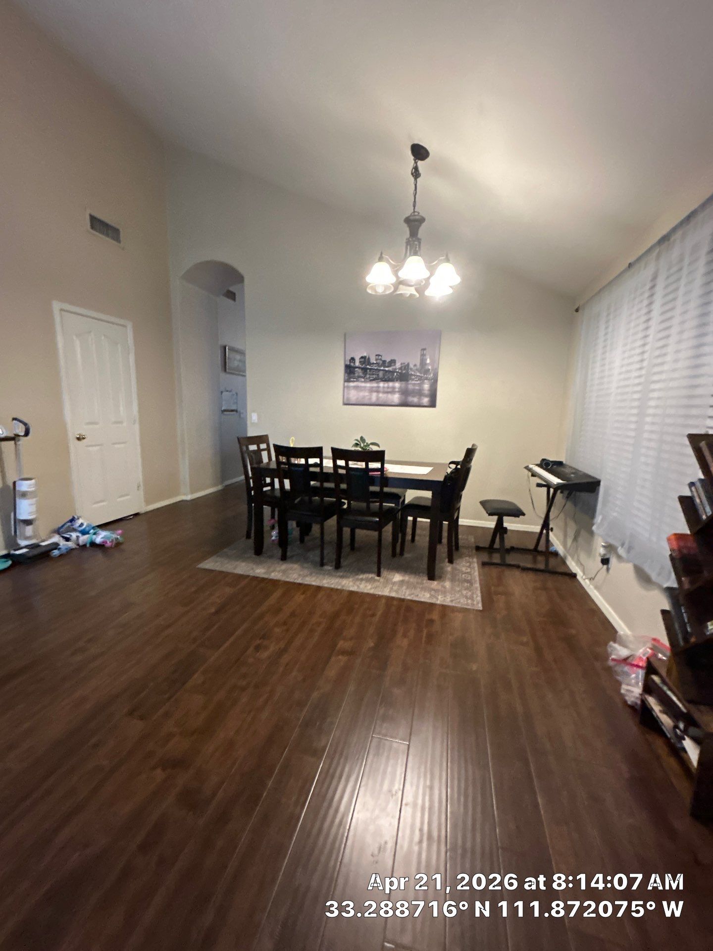 Dark Wood Laminate Floor Installation and Dining Room Renovation in Chandler by CompanyCam Sales Demo