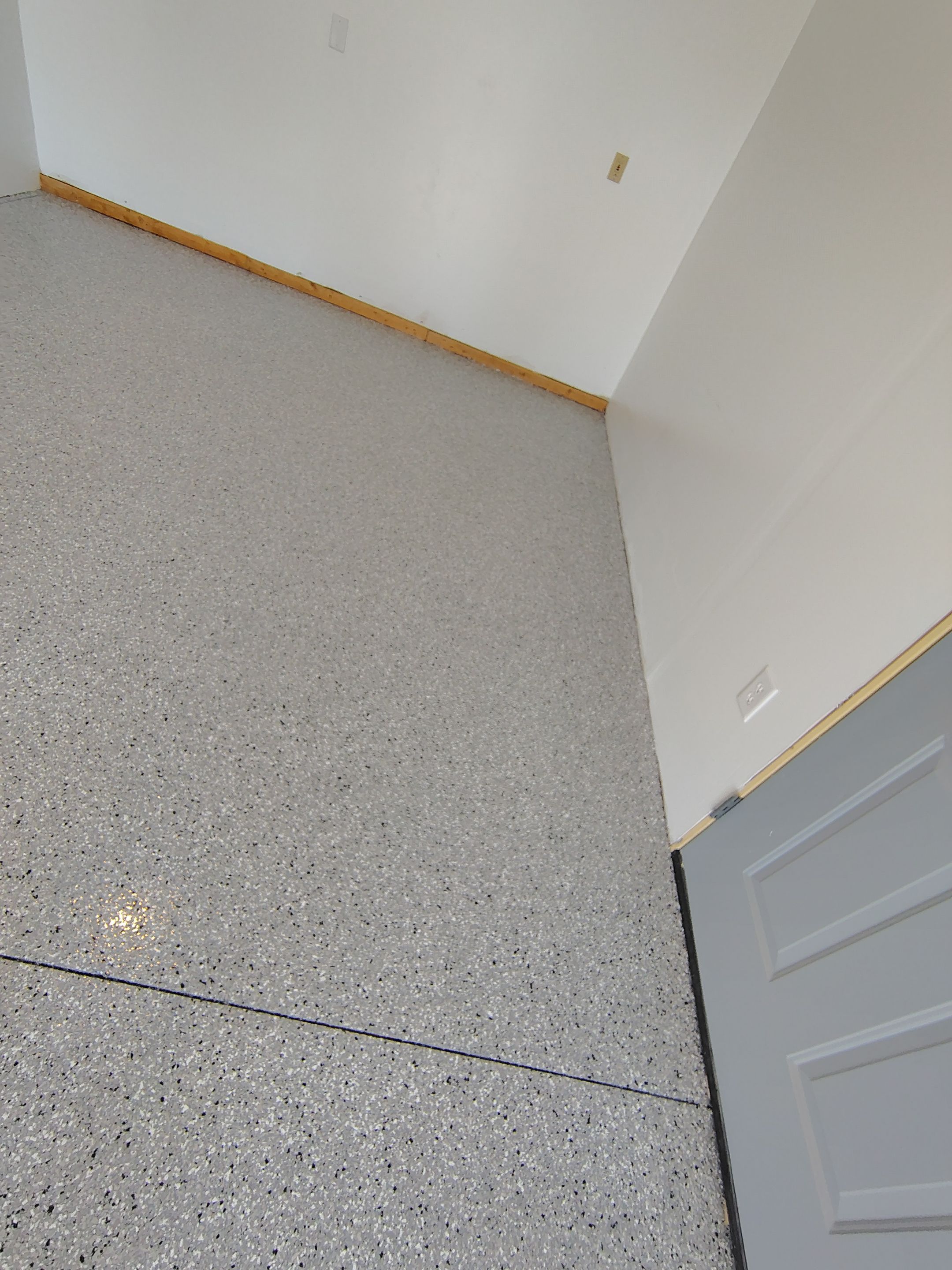 Decorative Chip Concrete Coating Installation in Luverne by Select Painting, Coatings & Garage Cabinets