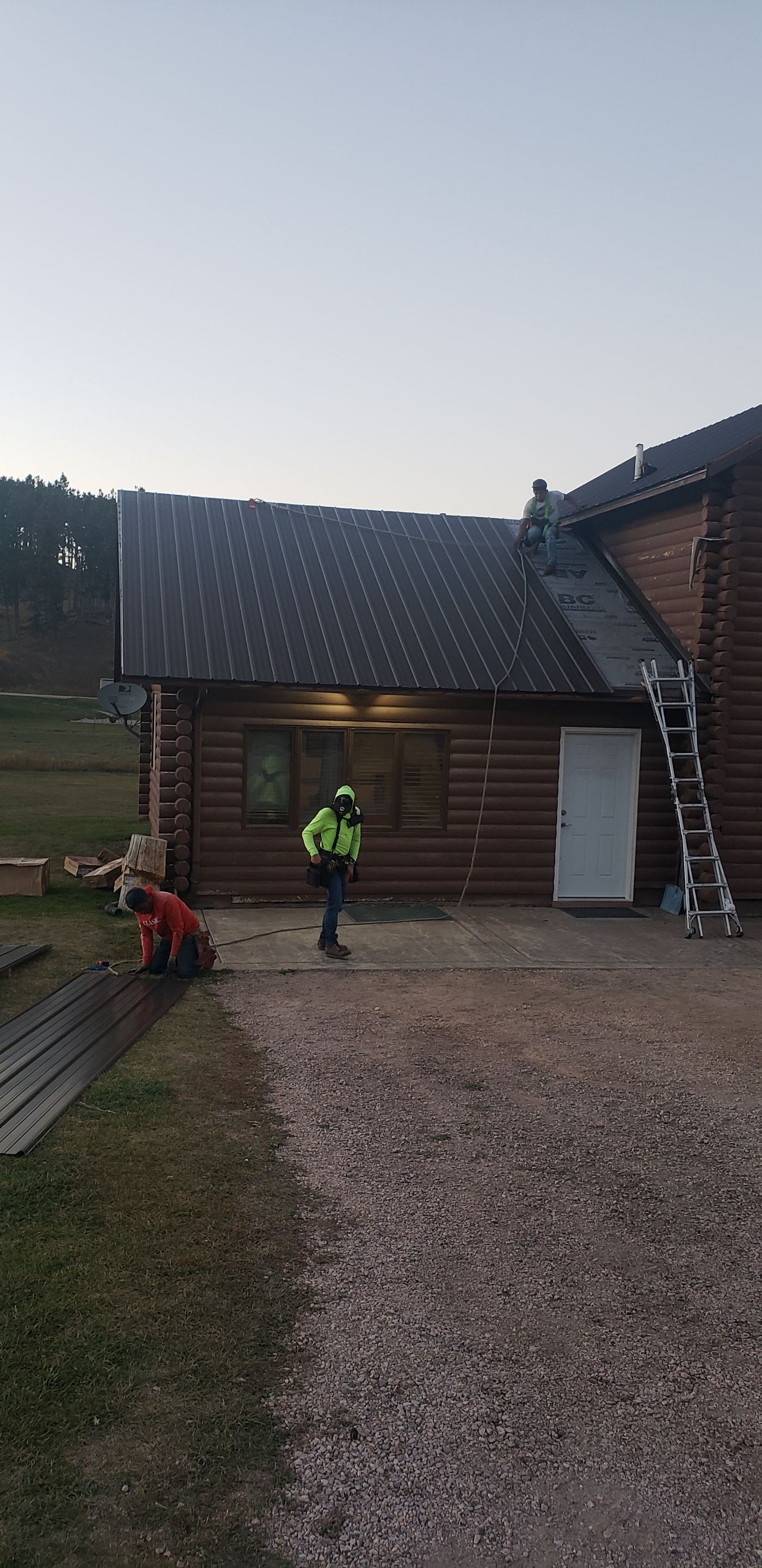 Hill Country Guest Ranch using Steel Roofing, Gutters, Log Cabin Staining by Lightning Exteriors