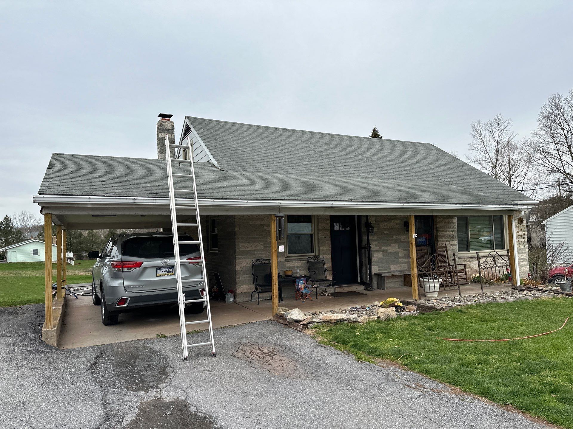 Metal Roofing, Board & Batten Siding, and Entry Door Transformation by Esh Builders
