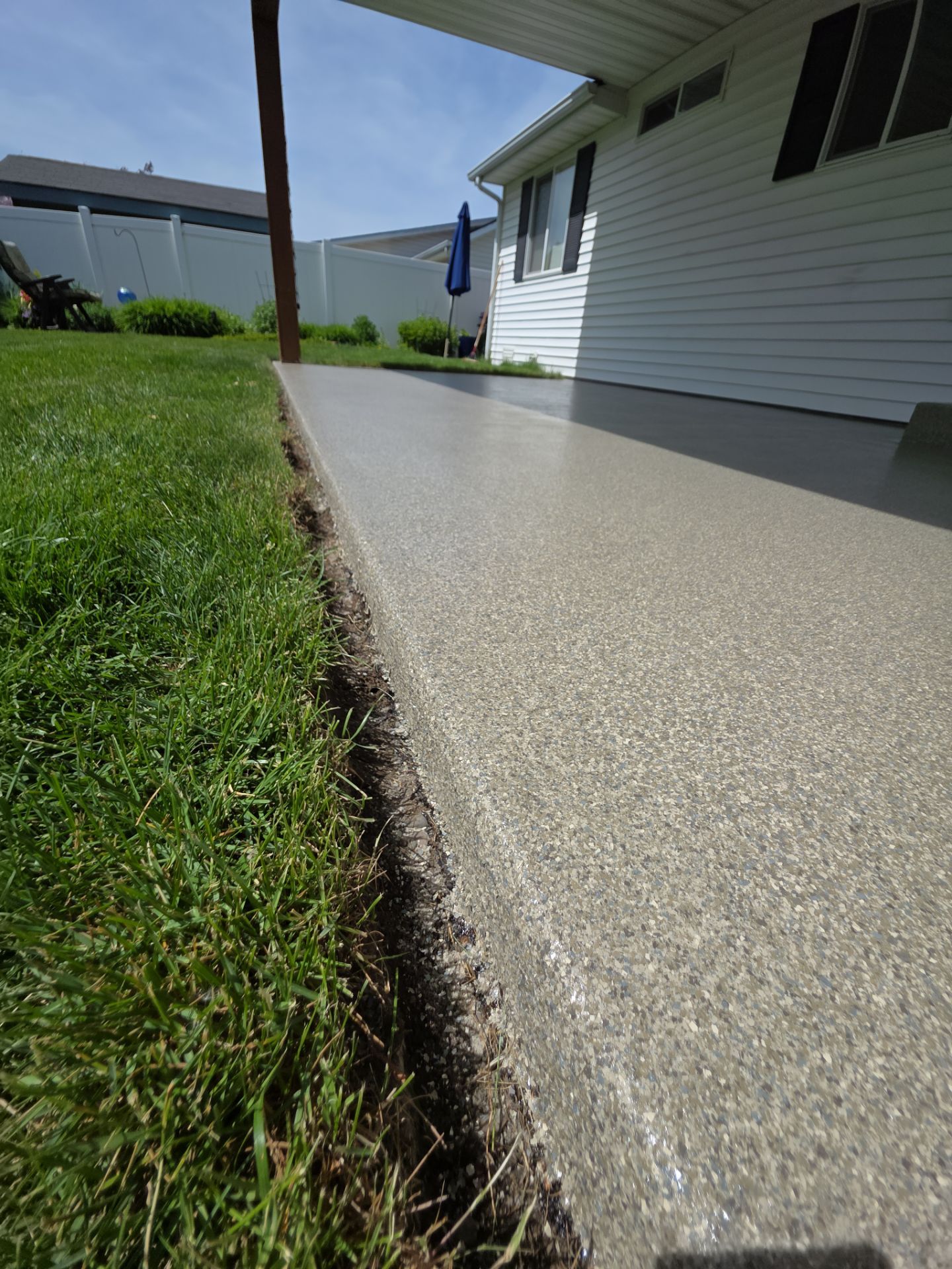 Coeur d'Alene Patio Transformation with Trail Mix Flake Coating by Croc Coatings, LLC