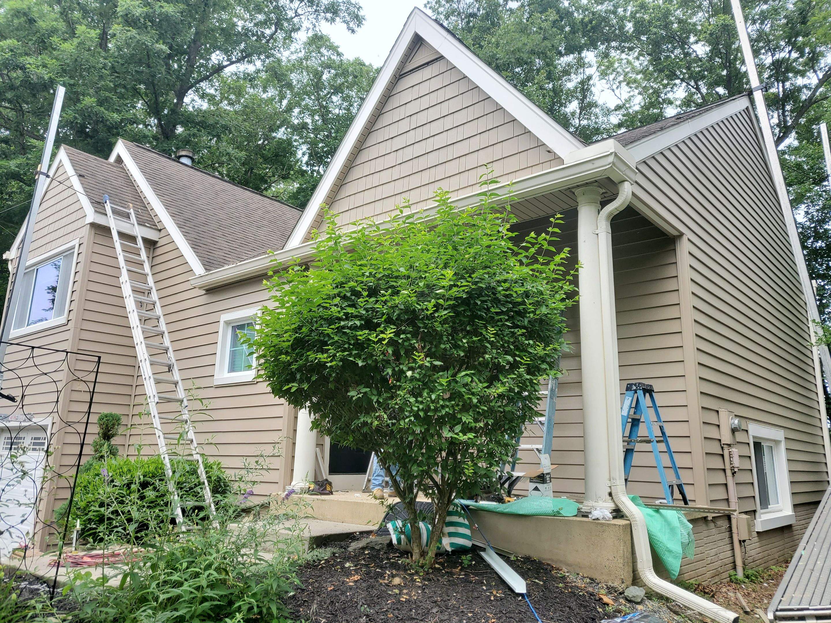 Mastic Siding + Interstate Windows by American Home Contractors