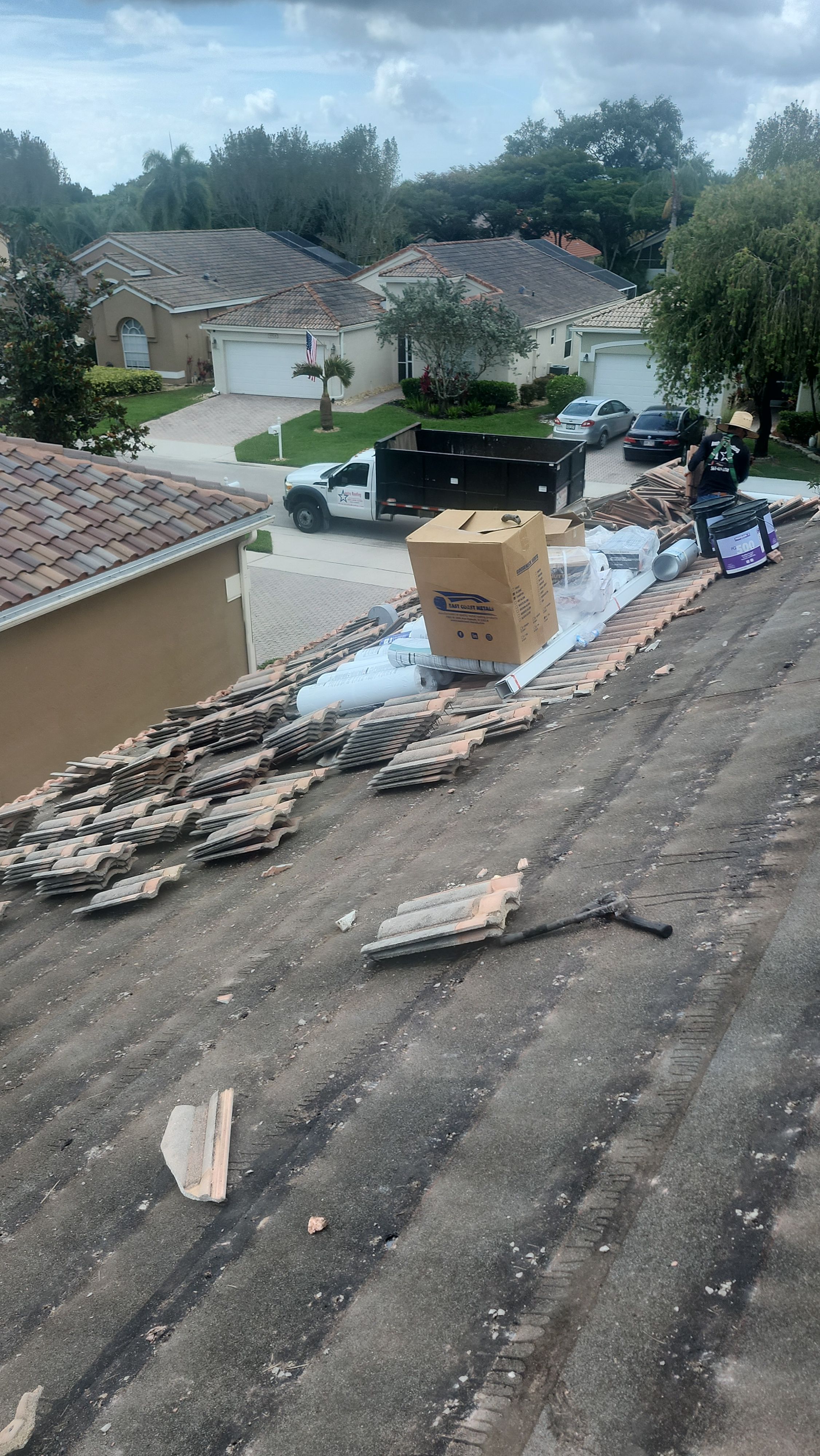 New Barrel Tile Roof Installation and Decking Repair in Boynton Beach by Aastro Roofing