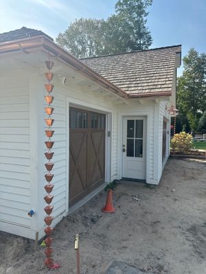 Custom Copper Gutter System and Accent Roofing in East Jordan