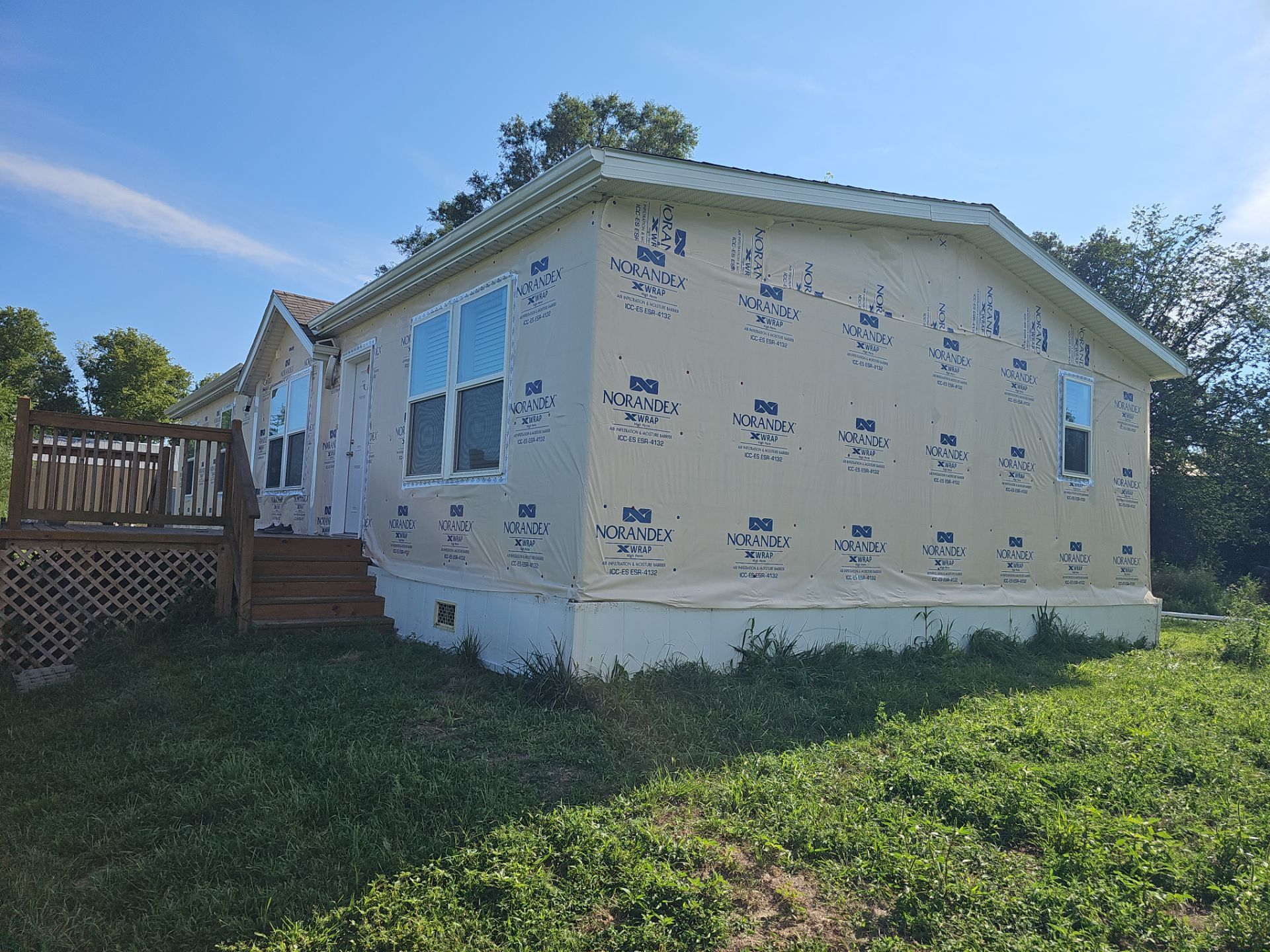 Riverdale Exterior Transformation | TAMKO Roofing & James Hardie Siding by Loyal Nine