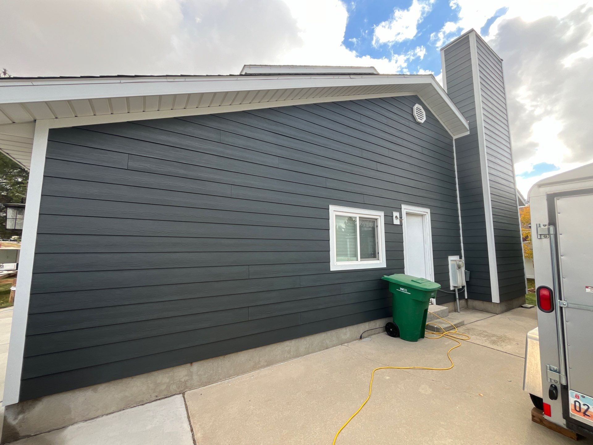 Sandy | Expansive Hardie Upgrade with Custom Accents | Iron Gray by Ideal Siding Utah
