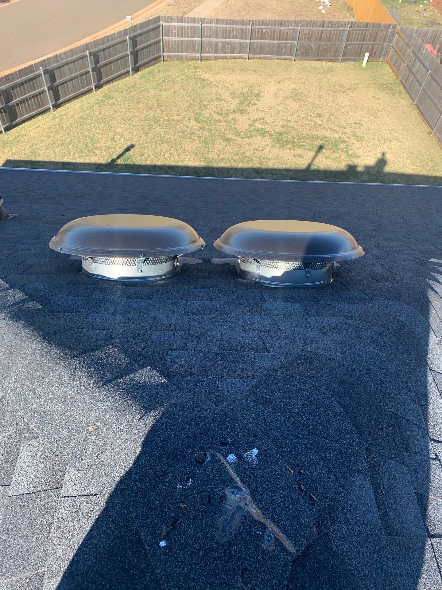 roof replacement & gutter installation in Edmond by McCann's Roofing and Construction