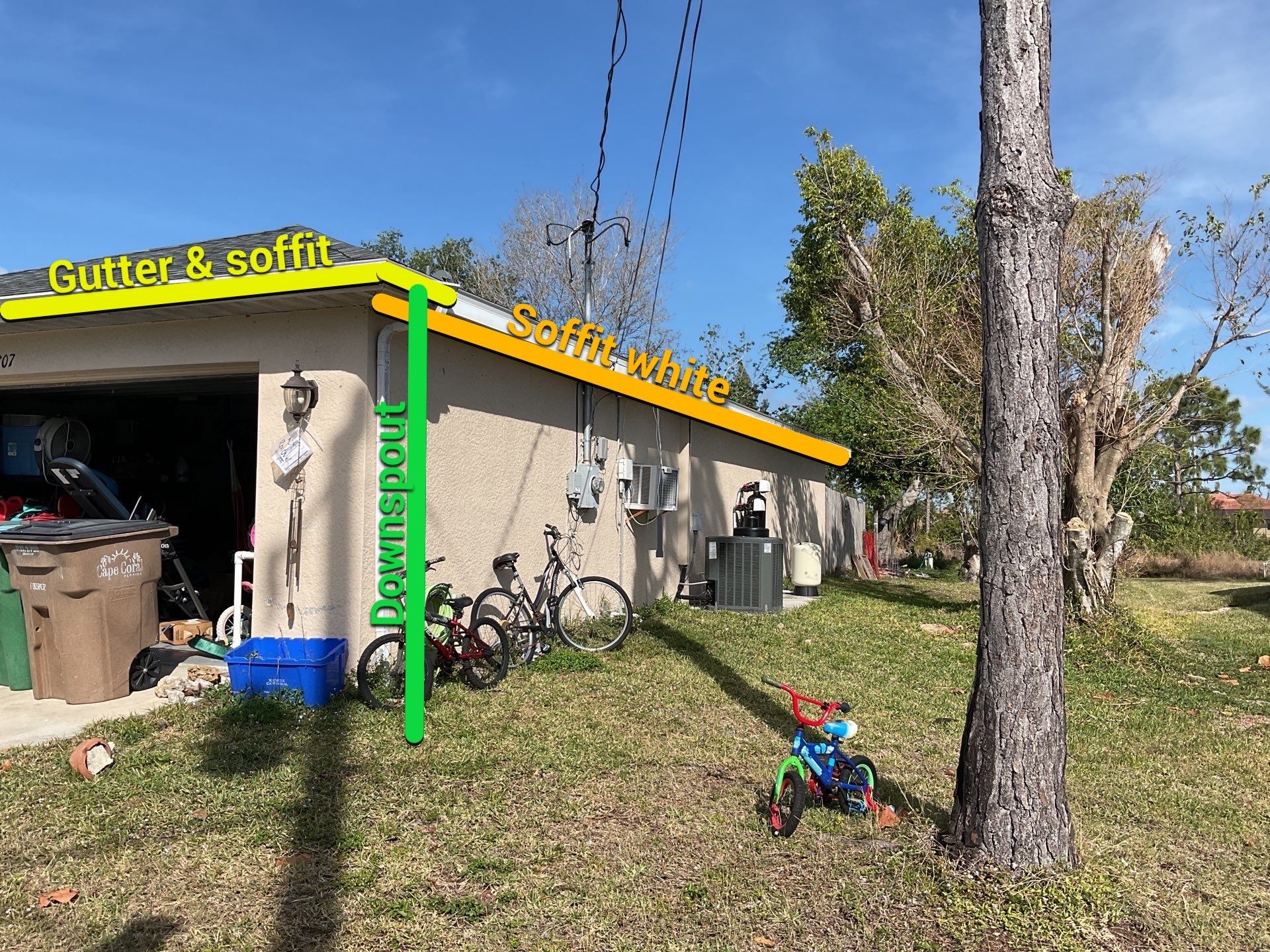 White Seamless Gutters and Soffit Installation in Cape Coral FL by Gutter Professors