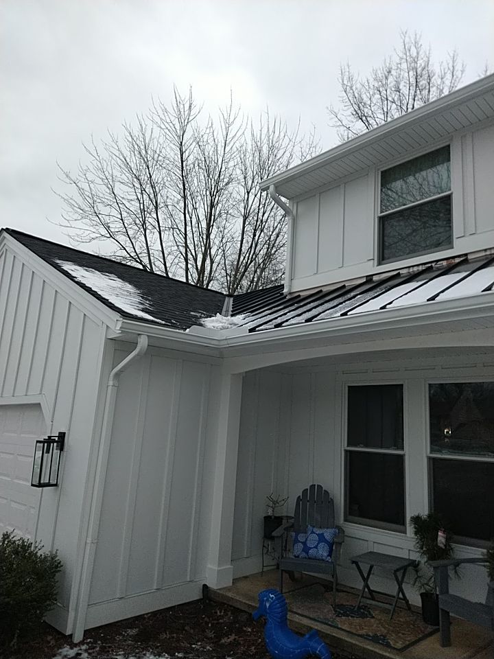 James Hardie Siding  using James Hardie Board and Batten, White by Absolute Roofing and Construction