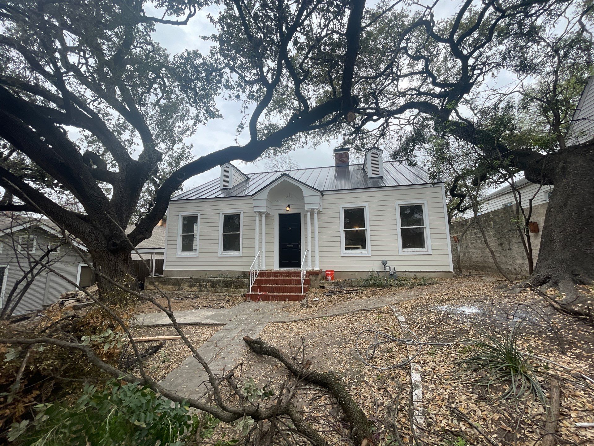 Metal Roof Replacement, Siding, Insulation, Windows, & Gutters. by Action Exteriors Austin