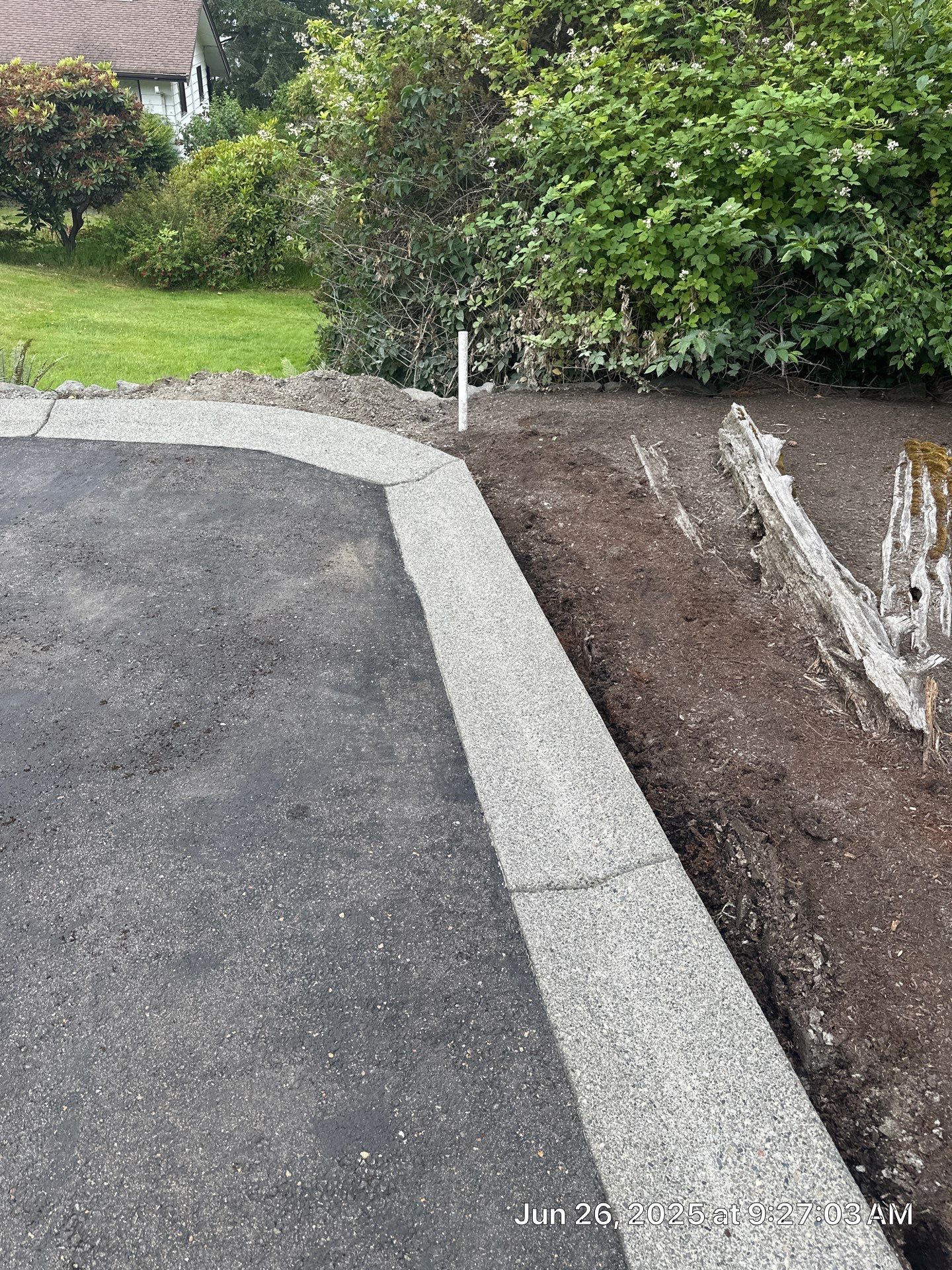 Concrete Driveway Makeover w/ Asphalt Patch | Everett  by Jireh Asphalt & Concrete Inc 
