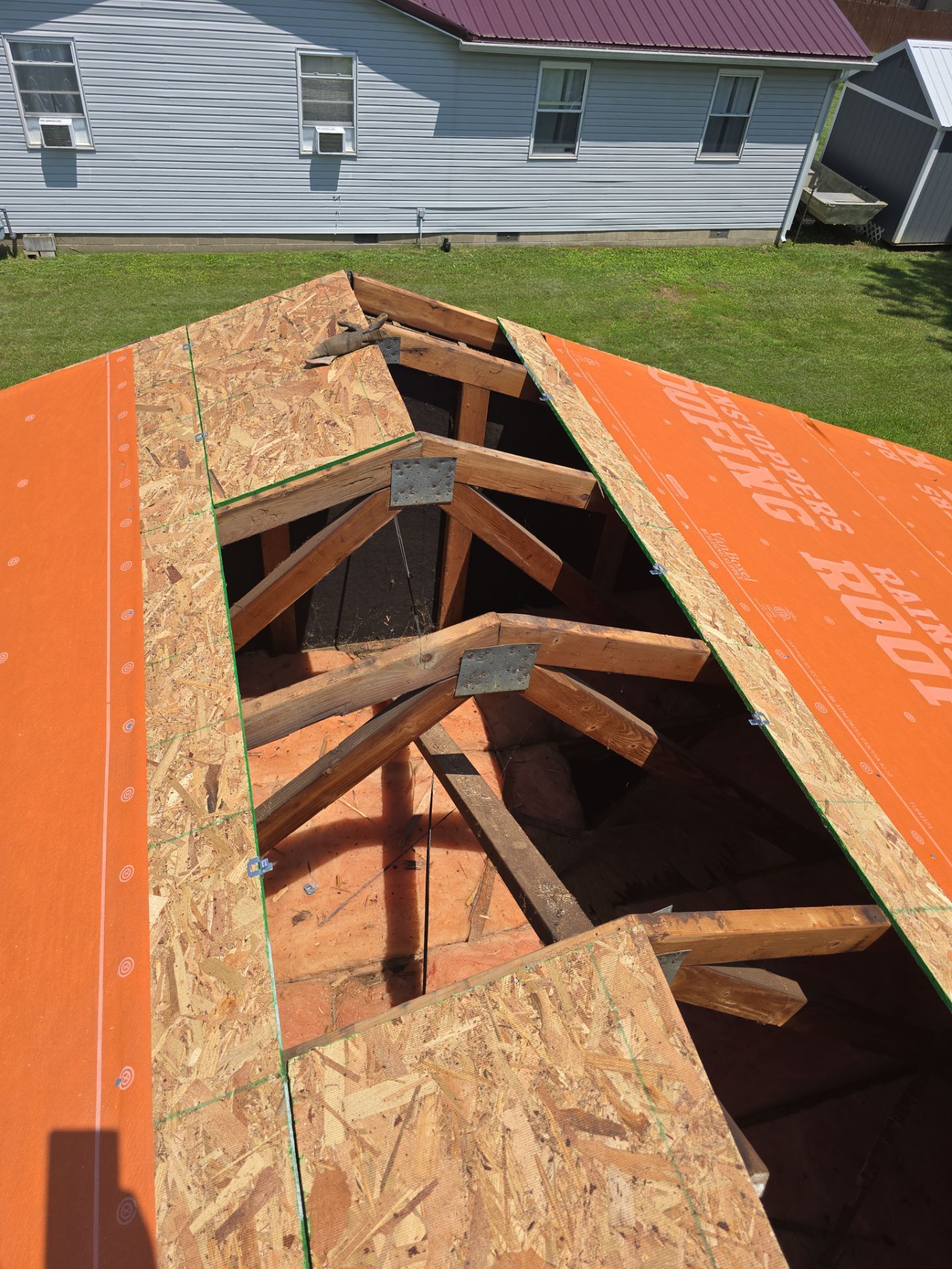 Residential Roofing Installation using Metal by Rainstoppers Roofing