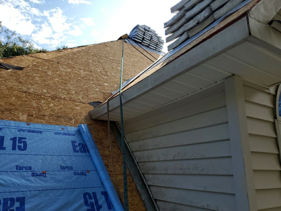 Residential Roofing Installation using Roof Replacement by American Roofing & Construction LLC