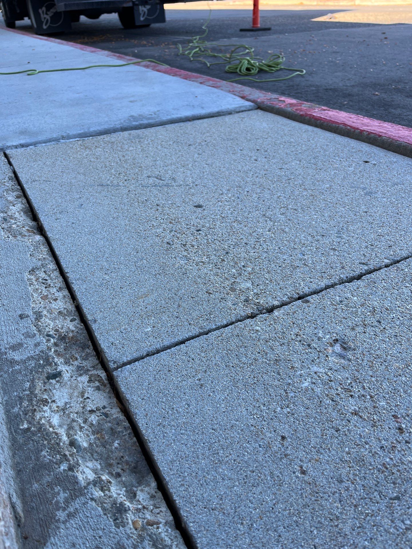 Sidewalk Lifting and Repair  by Mr. Mudd Concrete
