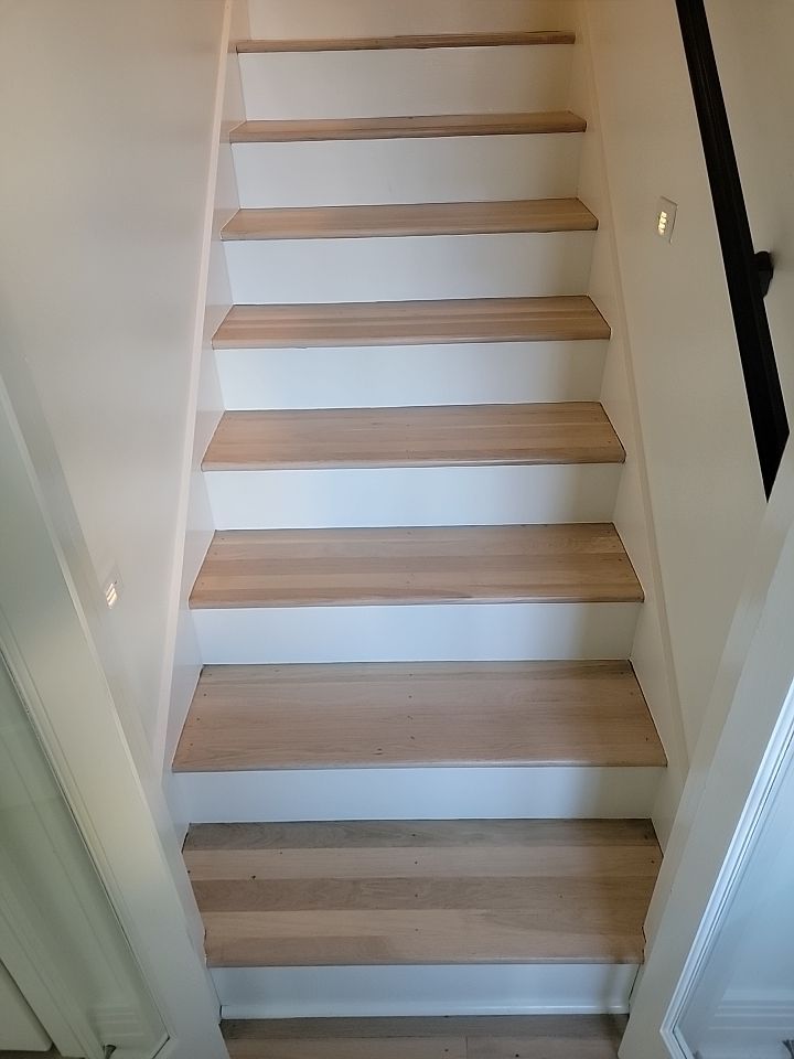 From dark to light, the results are stunning! Beautiful white oak refinish with Country White stain by Footprints Floors of Nashville