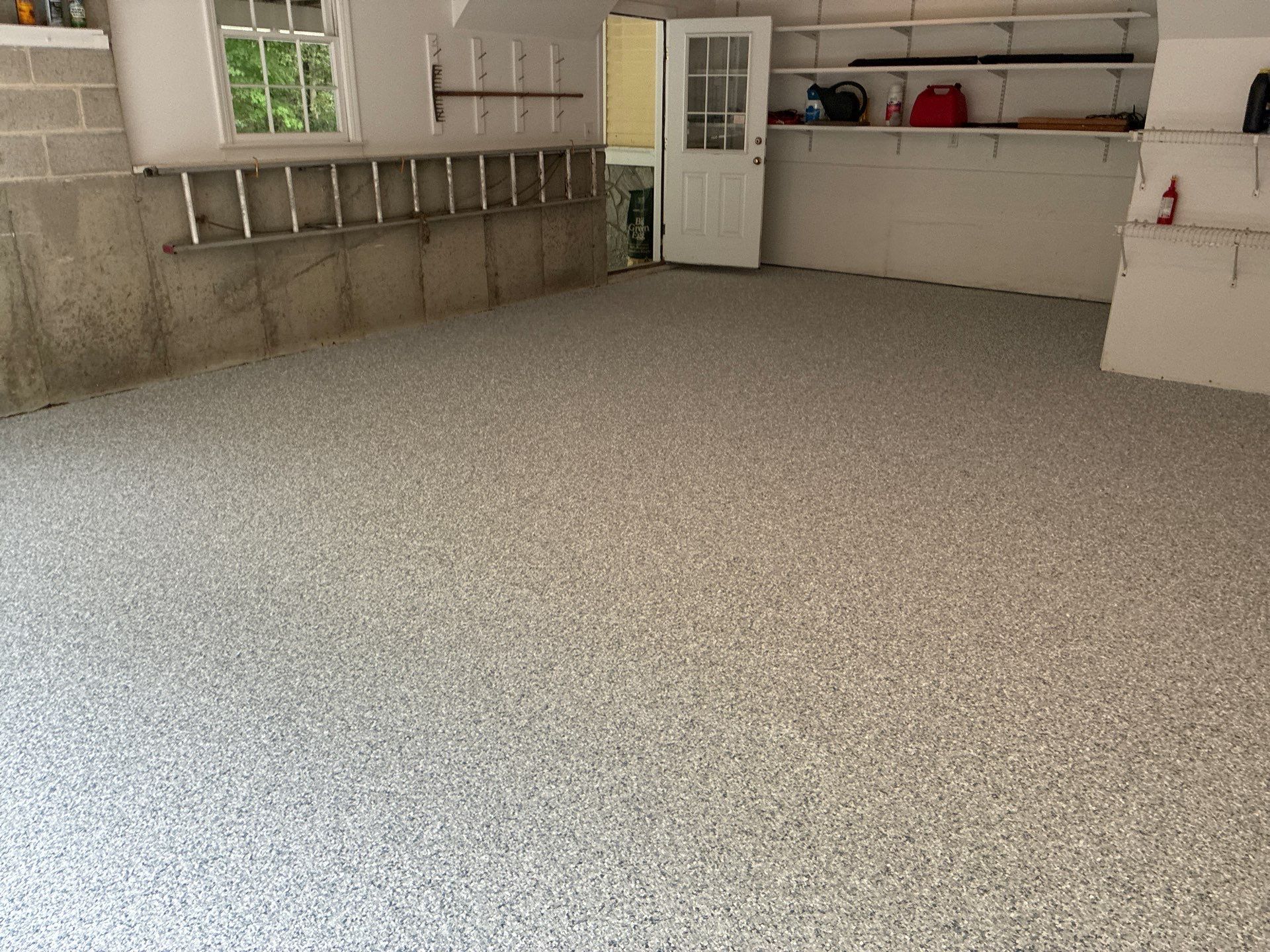 Tidal Wave Concrete Floor Coating Transformation by DiGiorgi Roofing and Siding Inc