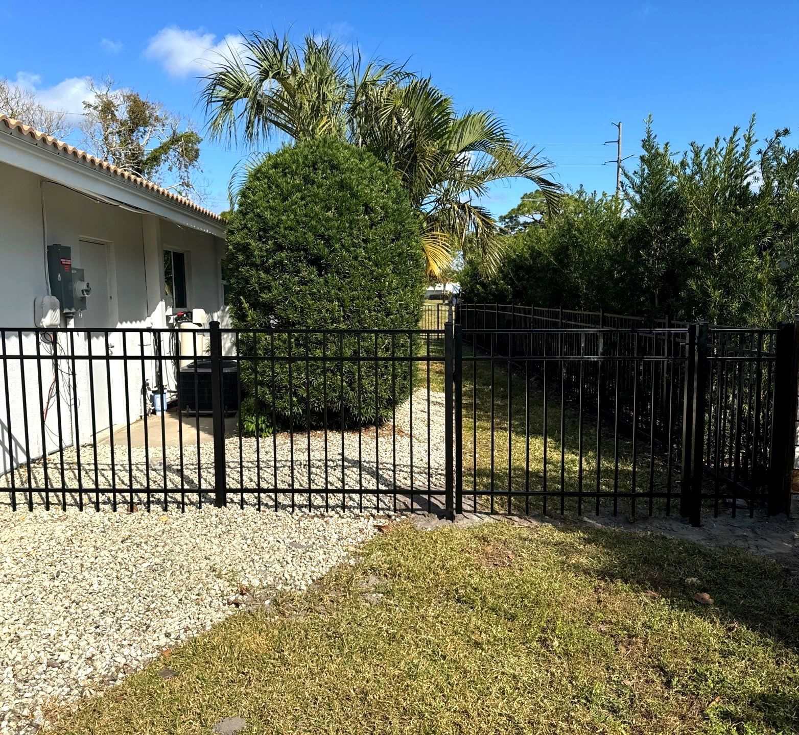 Aluminum Fence Installation using 3 Rail 4Ft Black Aluminum and 4Ft White Vinyl Fence by Asap fence and gates, LLC