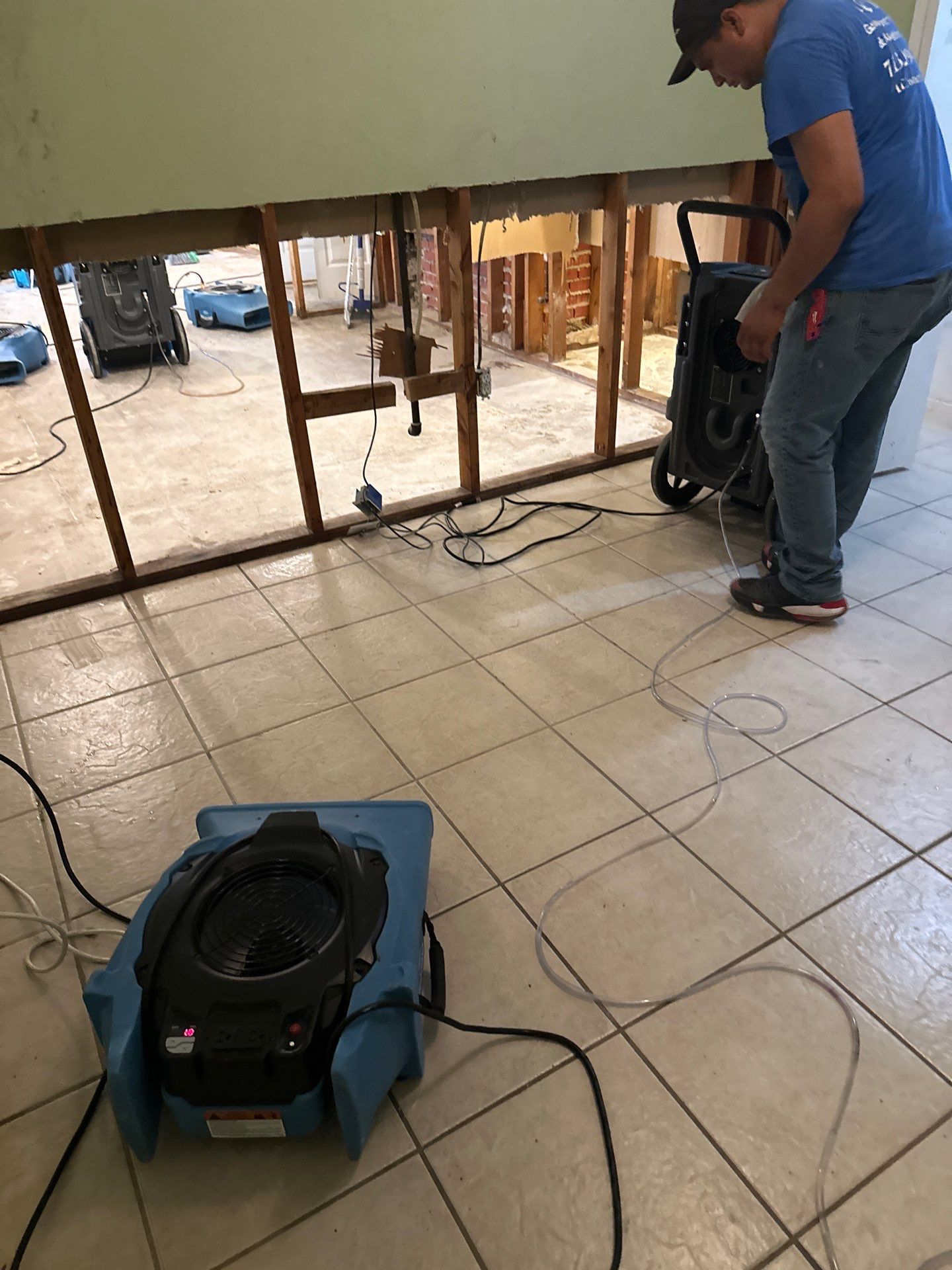 Home Remodel after Huge Water Damage by L&T General Contractors and Restoration INC