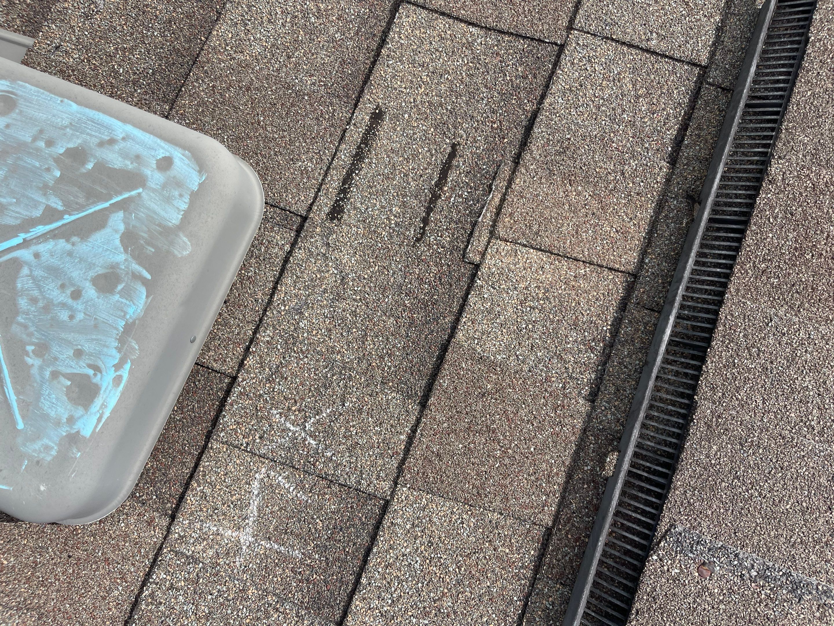 Hail Damage on a Roofing System by Icon Roofing And Construction 