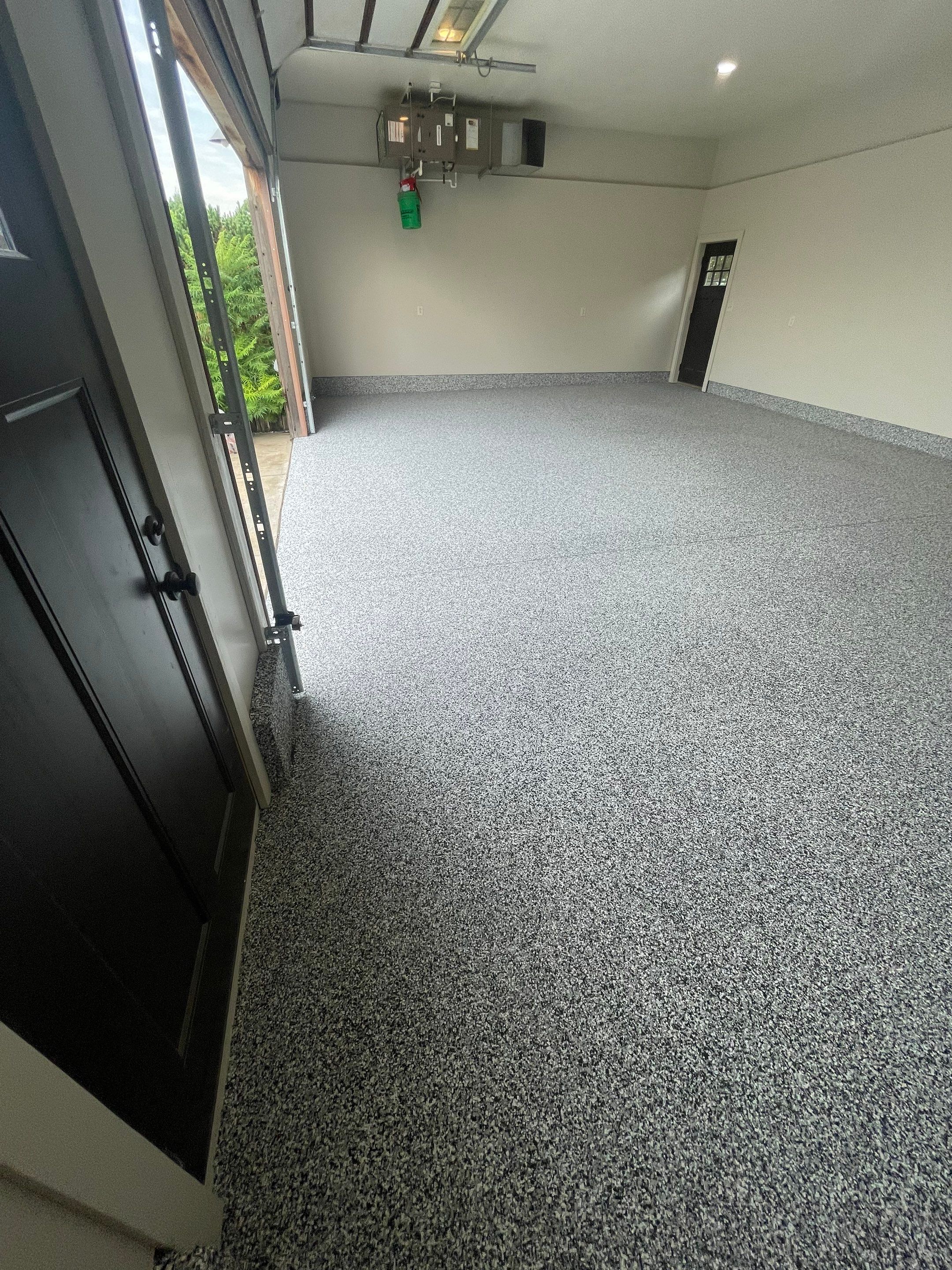 Domino Flake Floor Coating and Crack Repair in Chancellor by Select Painting, Coatings & Garage Cabinets