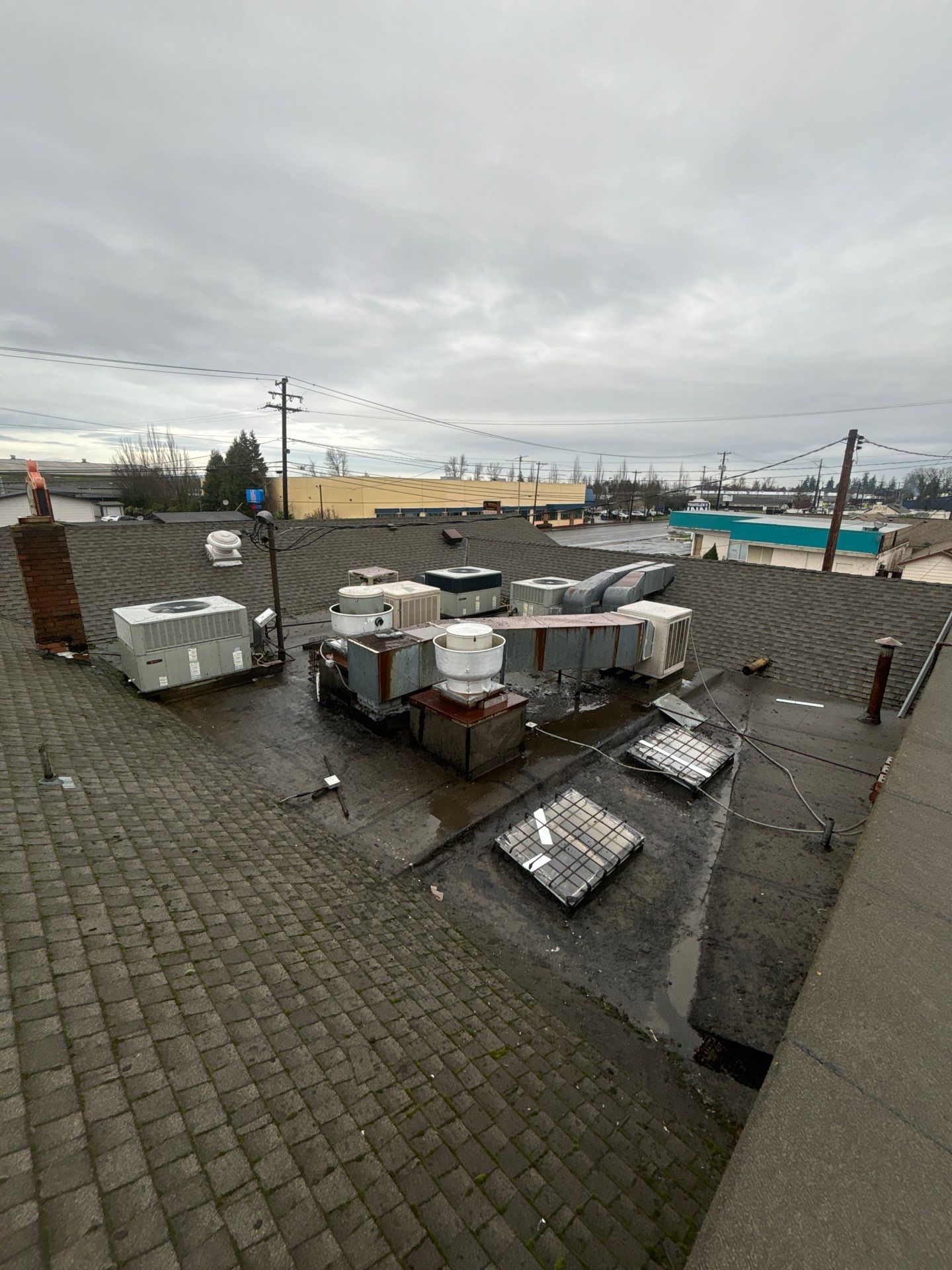 Summit Grey Lum Yun Salem Oregon Commercial Roof by Orezona Building & Roofing Company, Inc.