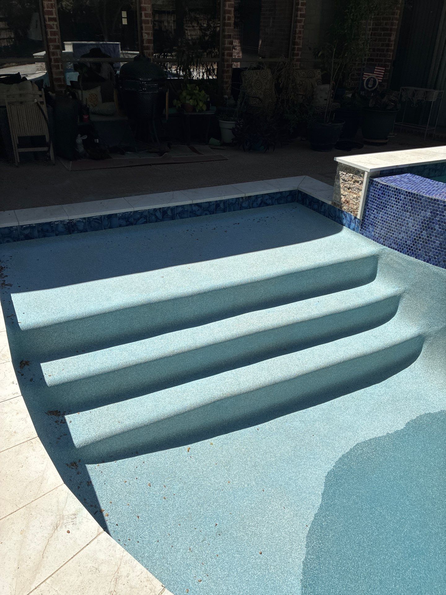Freeform Pool Remodel with Raised Spa and New Tile by Pinnacle Pools and Spas - DFW