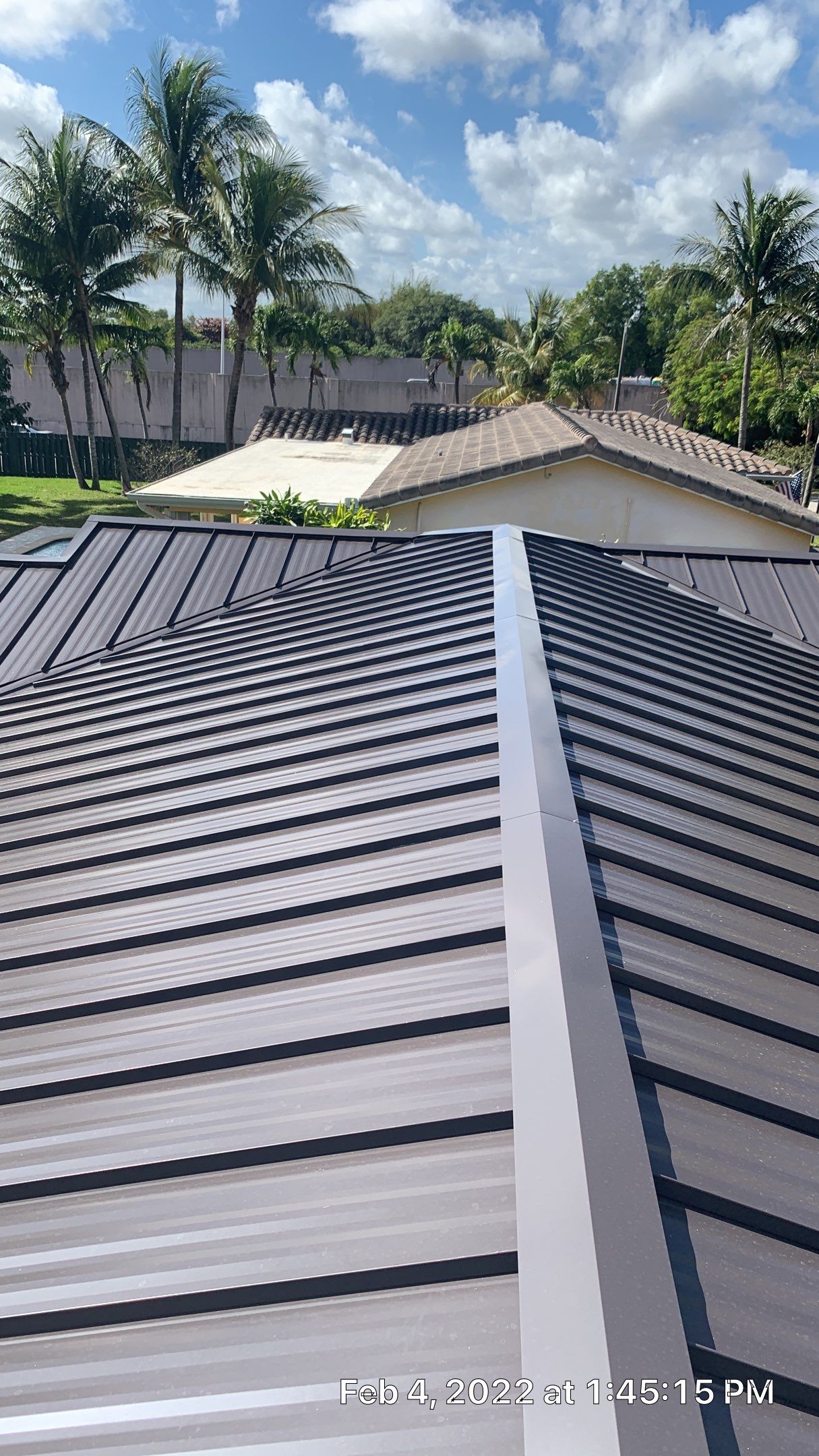 Residential Roofing Installation using 1" Nail strip metal roof by BLUES BROTHERS CONSTRUCTION CORP