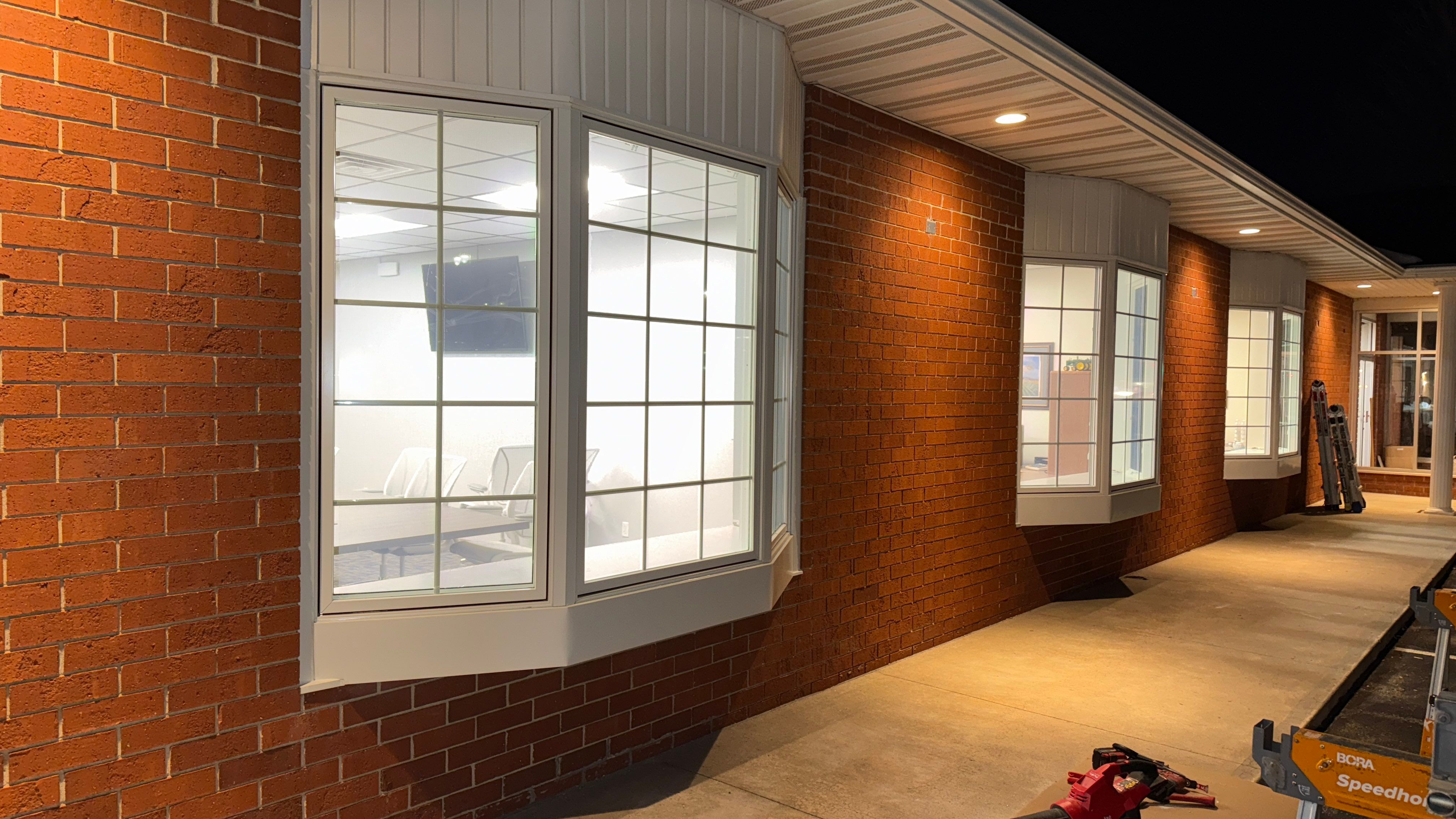 Pella Window installation using Pella Lifestyle wood/Aluminum window by United Windows and Siding LLC