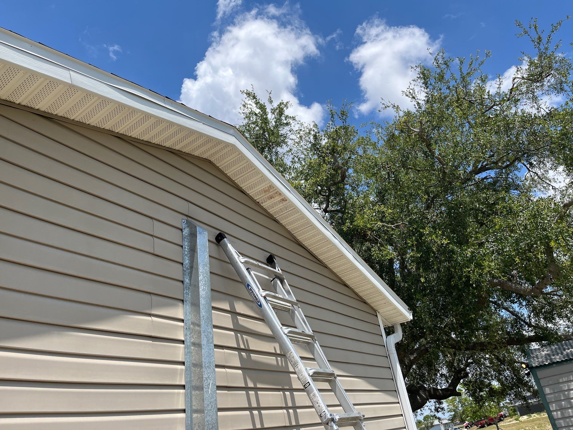 Replace gutter using Leaf Guard in Cape Coral FL by Gutter Professors