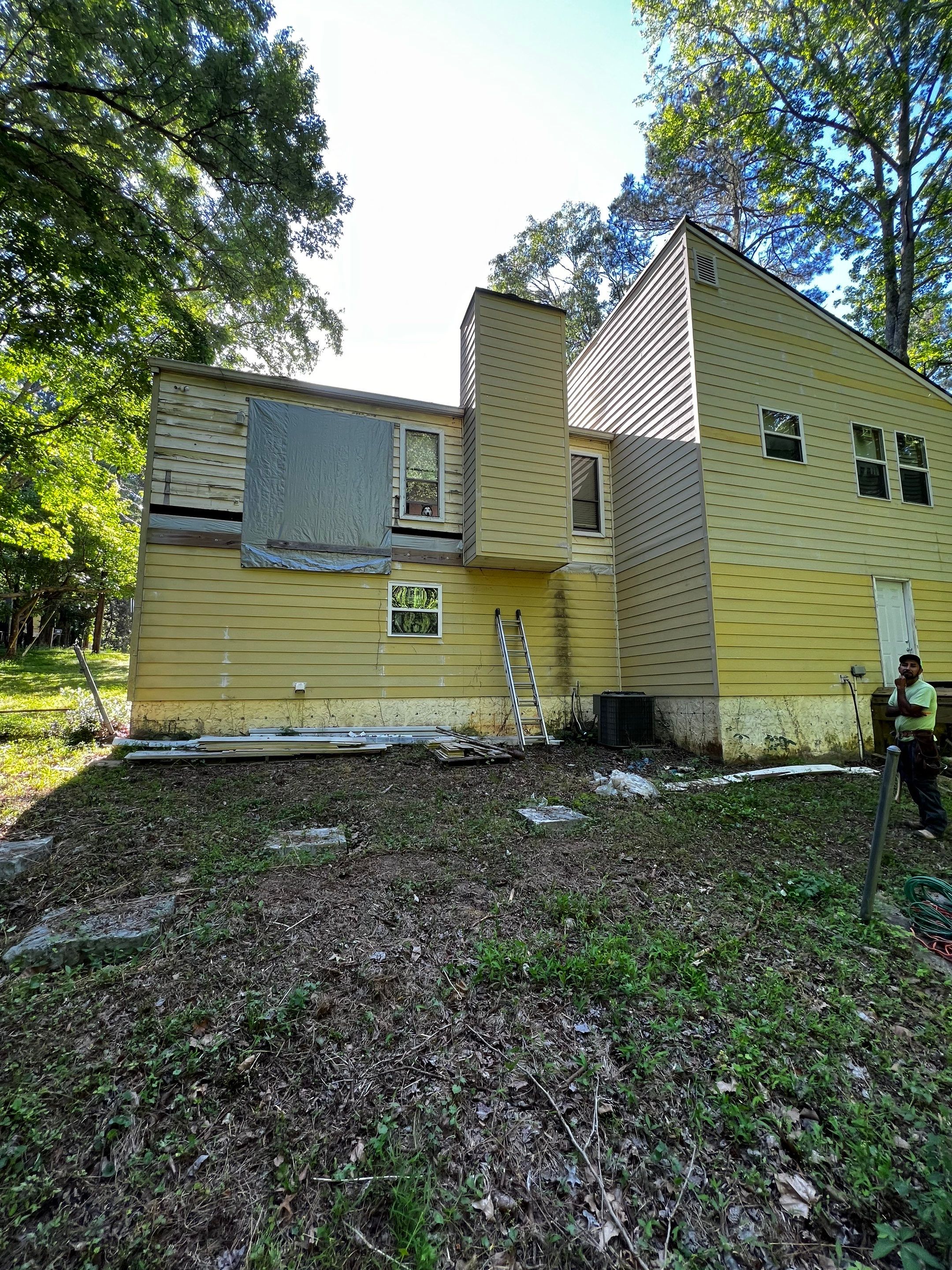 Elevated Wood Deck and Blue Lap Siding Installation in Kennesaw by Swift Home Renovations