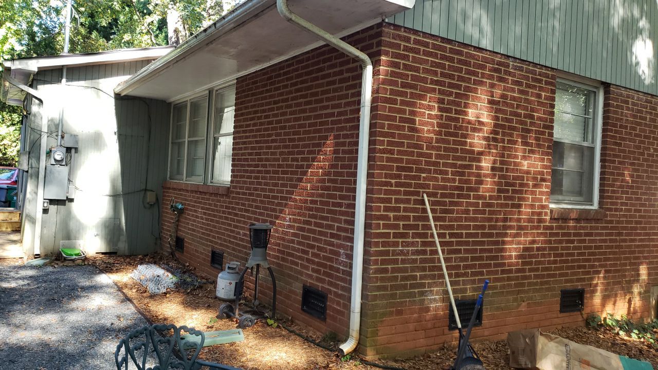 House Wash using cleaner by Power Wash Masters LLC
