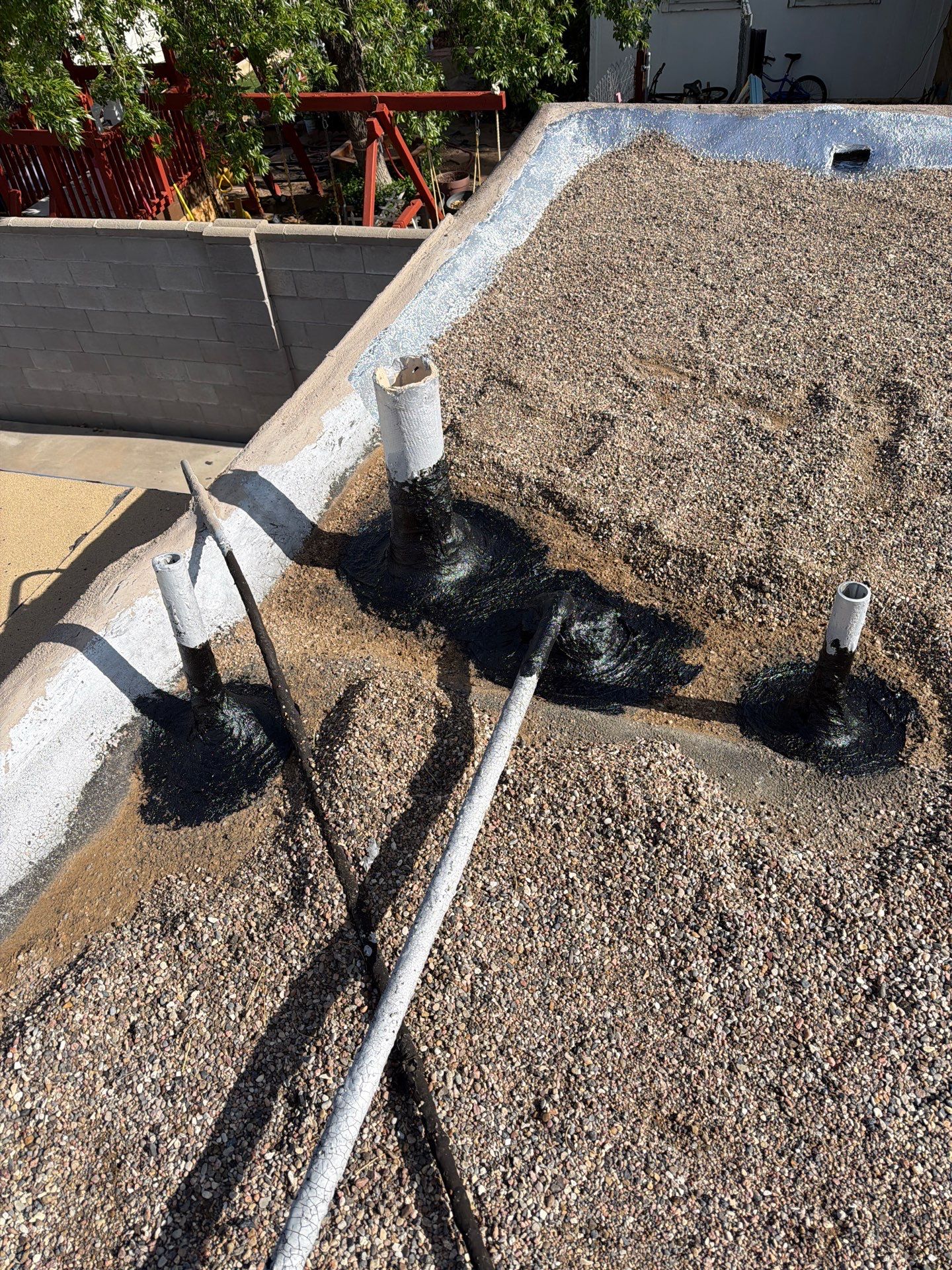 Albuquerque Flat Roof Replacement Using Tan Modified Bitumen Membrane by Doyle Roof Masters Inc