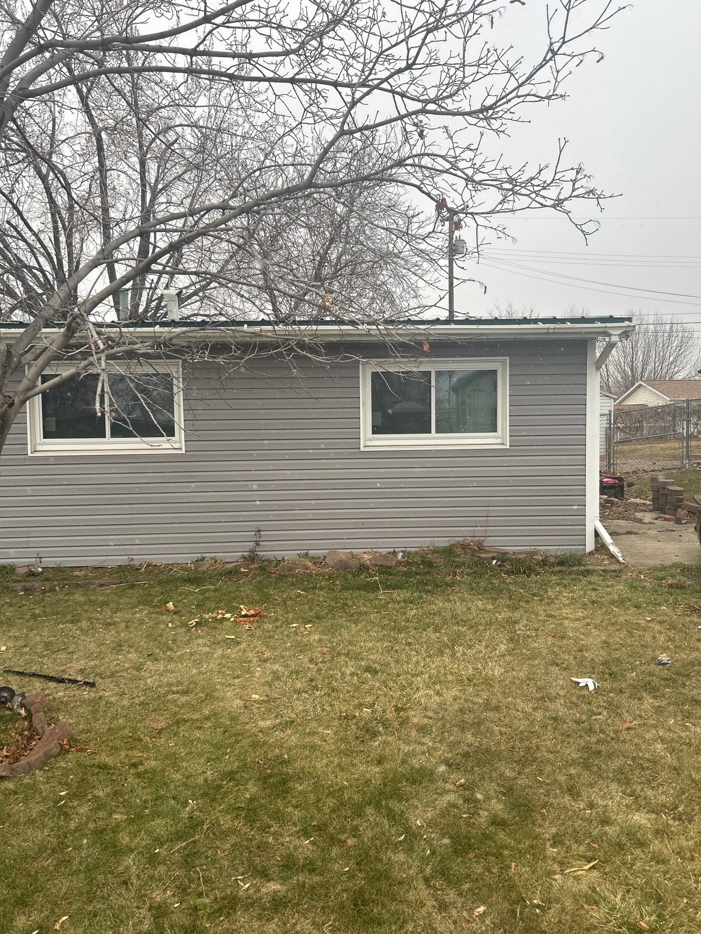 Orem | Elegant Aluminum-to-Vinyl Transformation | Harbor Grey & White by Ideal Siding Utah