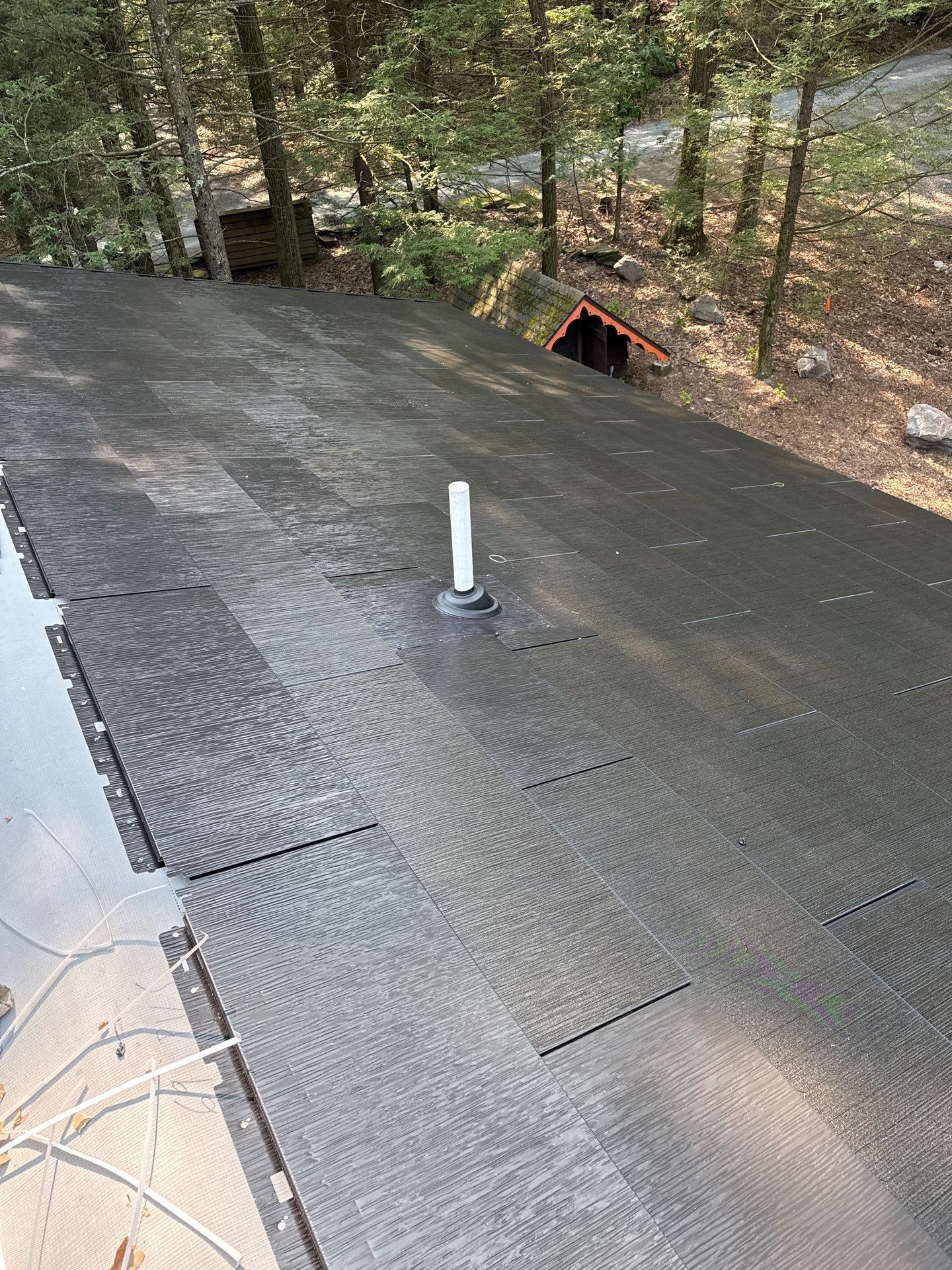 Stunning Tesla Solar Roof Cabin in the Woods by American Home Contractors