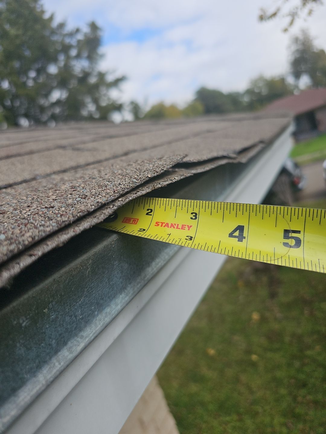 "Full Roof Replacement Due to Hail and Water Damage – Before & After" by road roofing llc