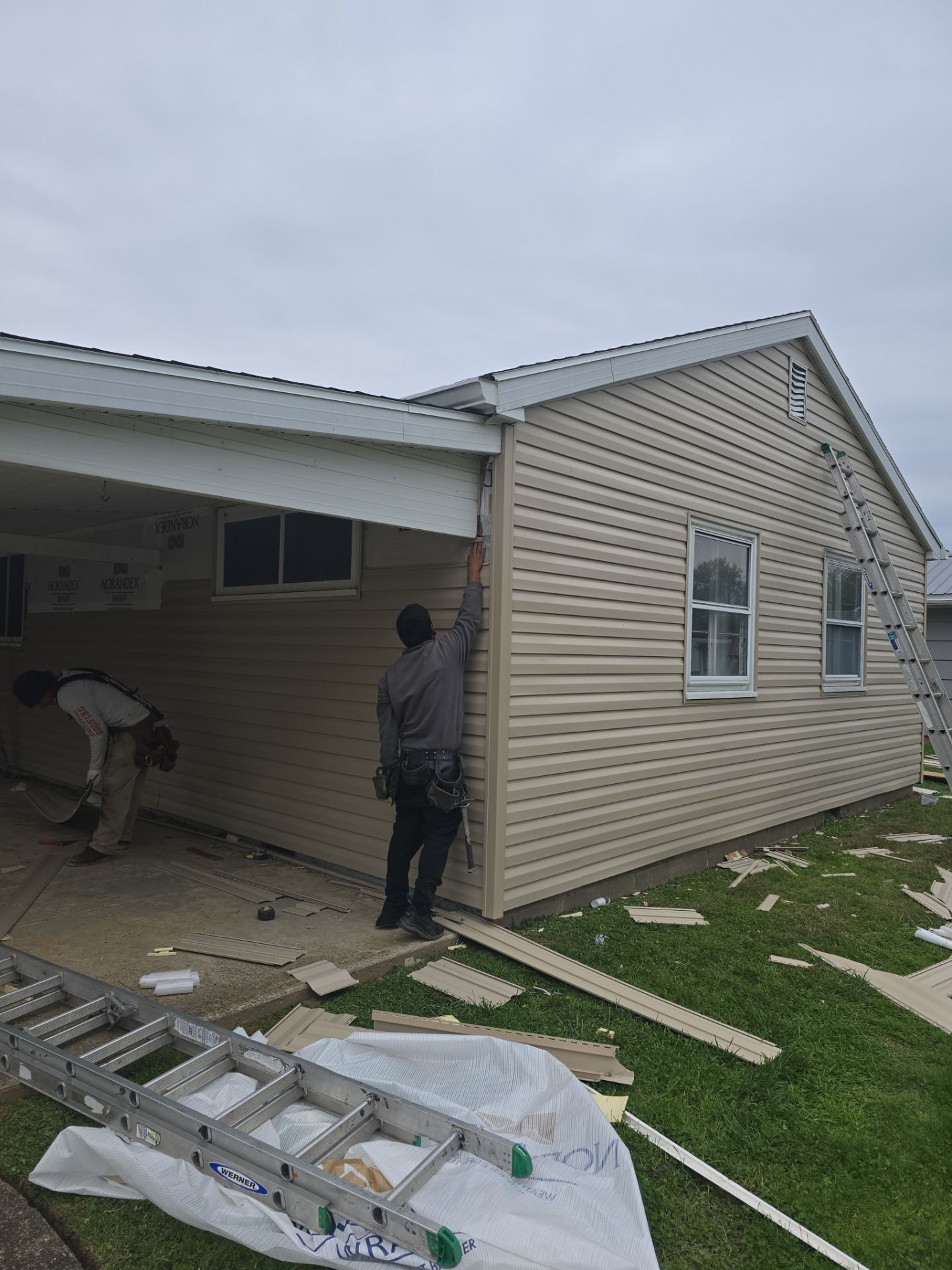 Siding Installation using Vinyl Siding by Rainstoppers Roofing