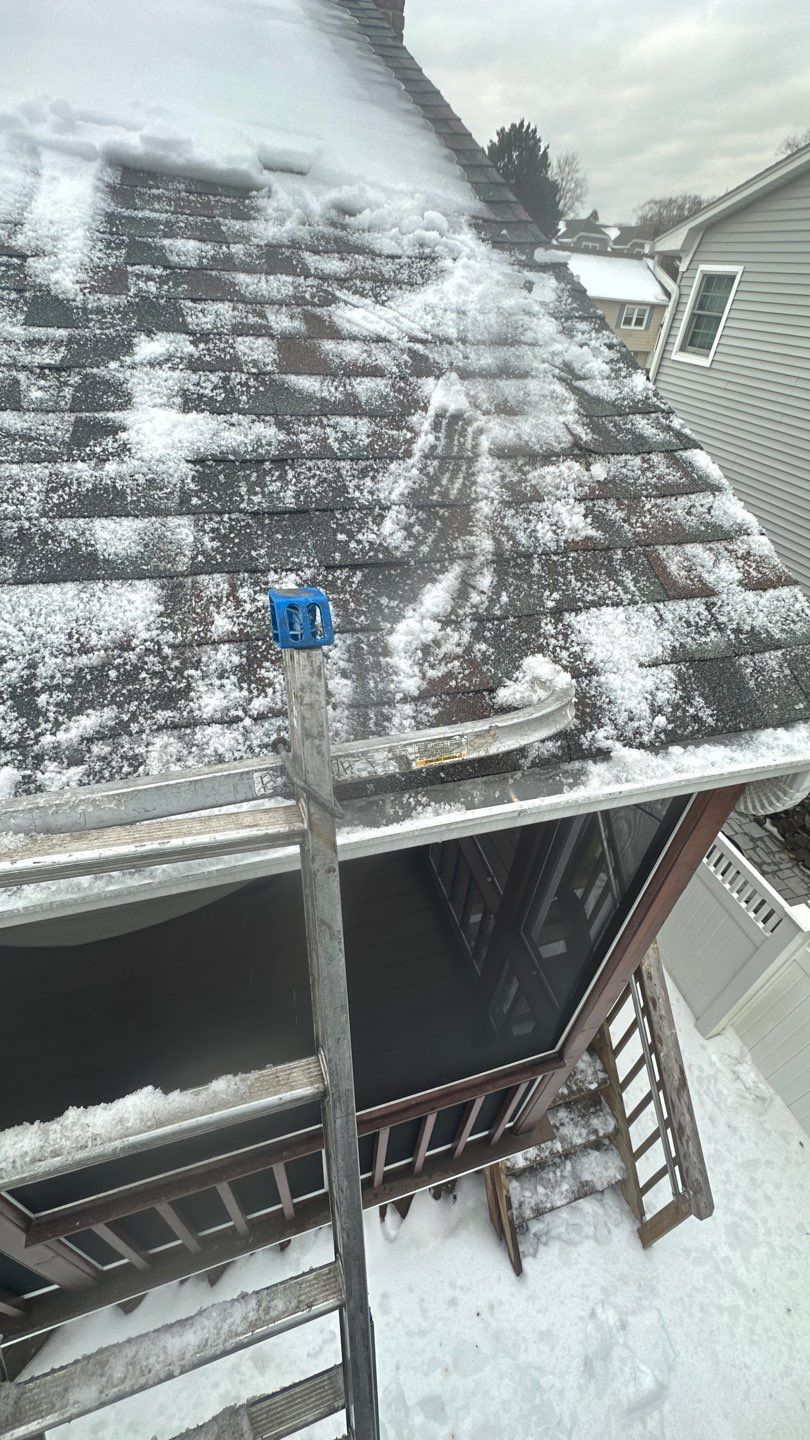 Roof Snow & Ice Dam Removal by Above All Gutters