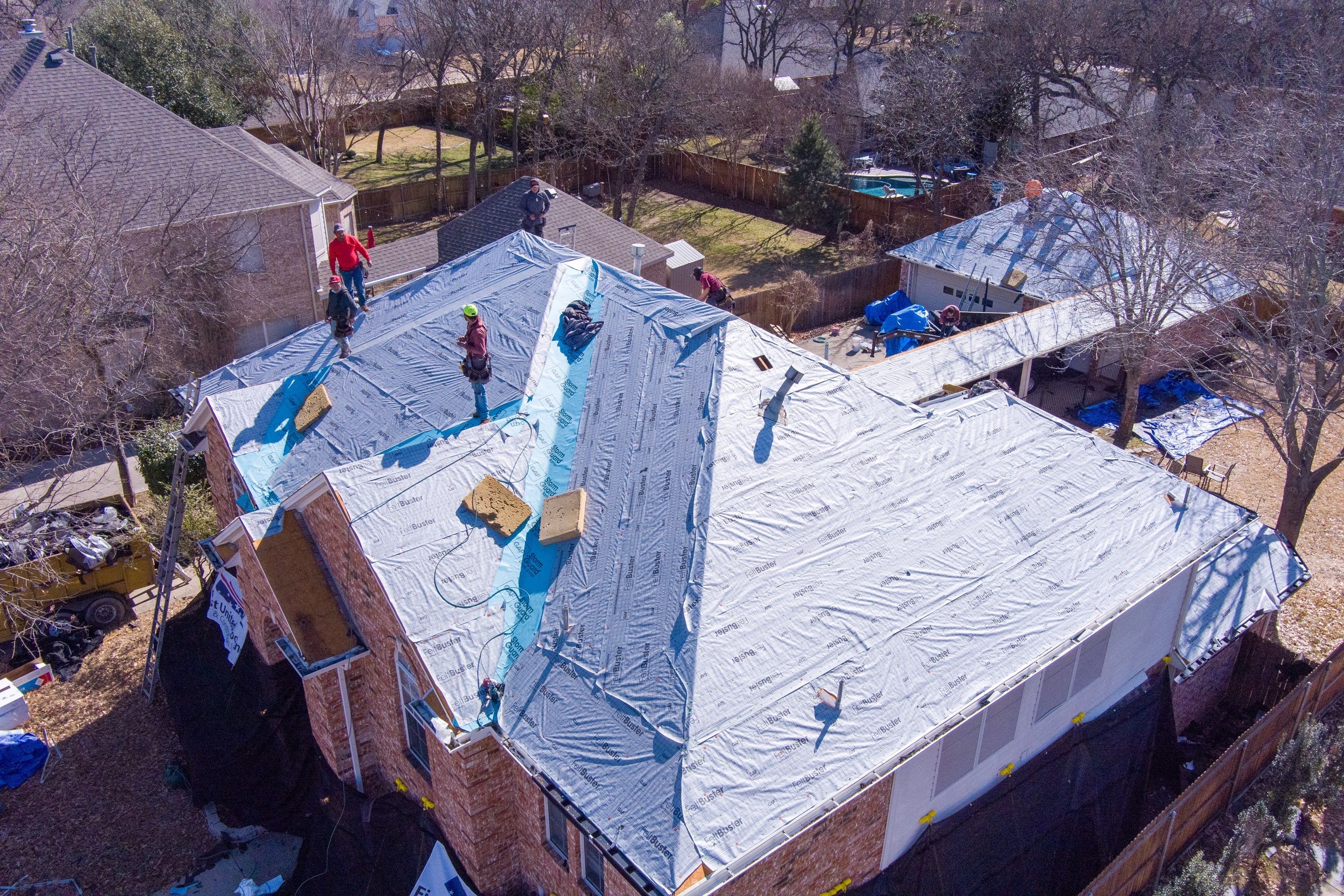 Major storm damage required full roof replacement along with other exterior repairs by First United Roofing & Construction