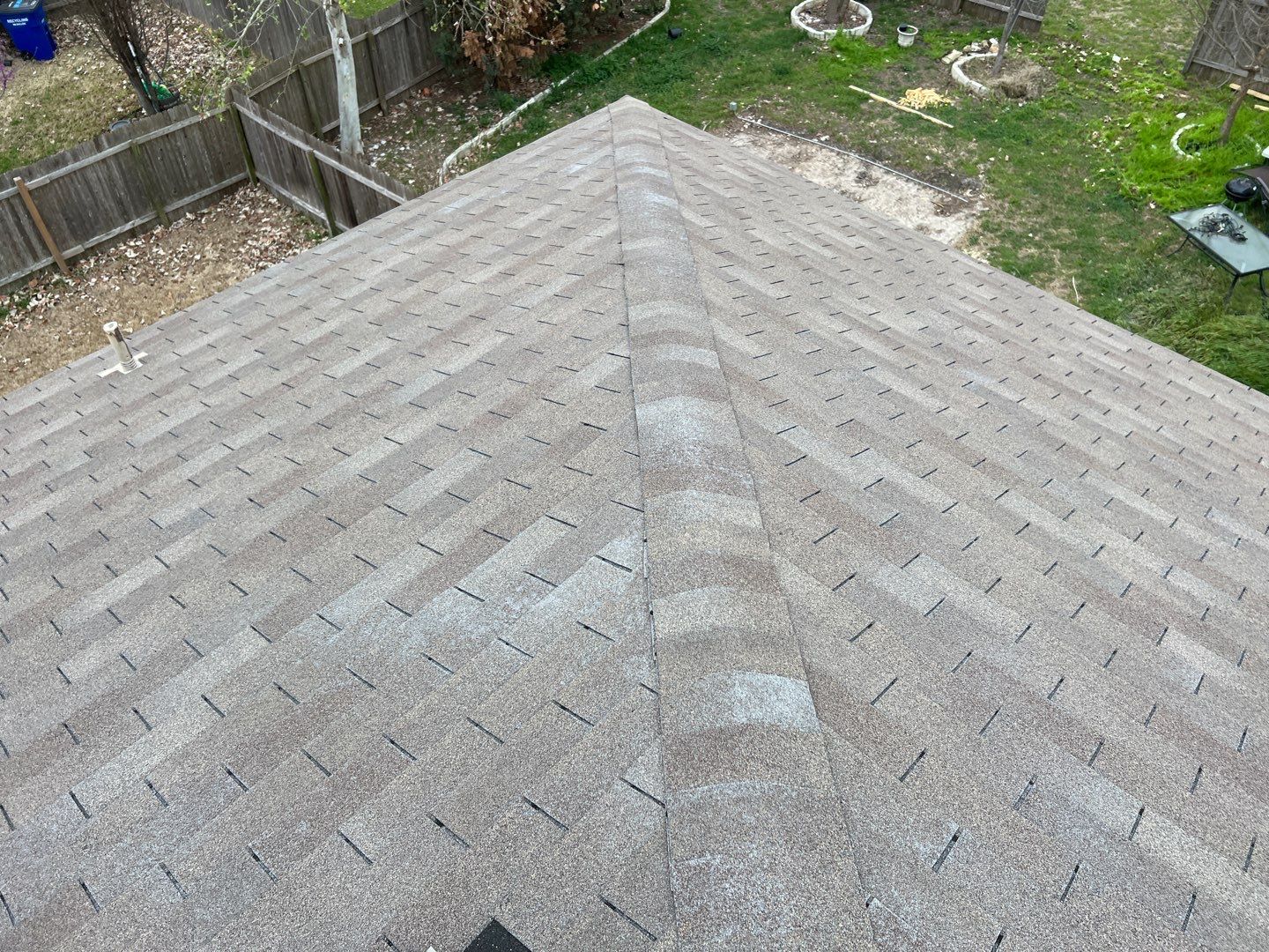 Wind damaged roof replacement by Oakwood Roofing and Construction, LLC